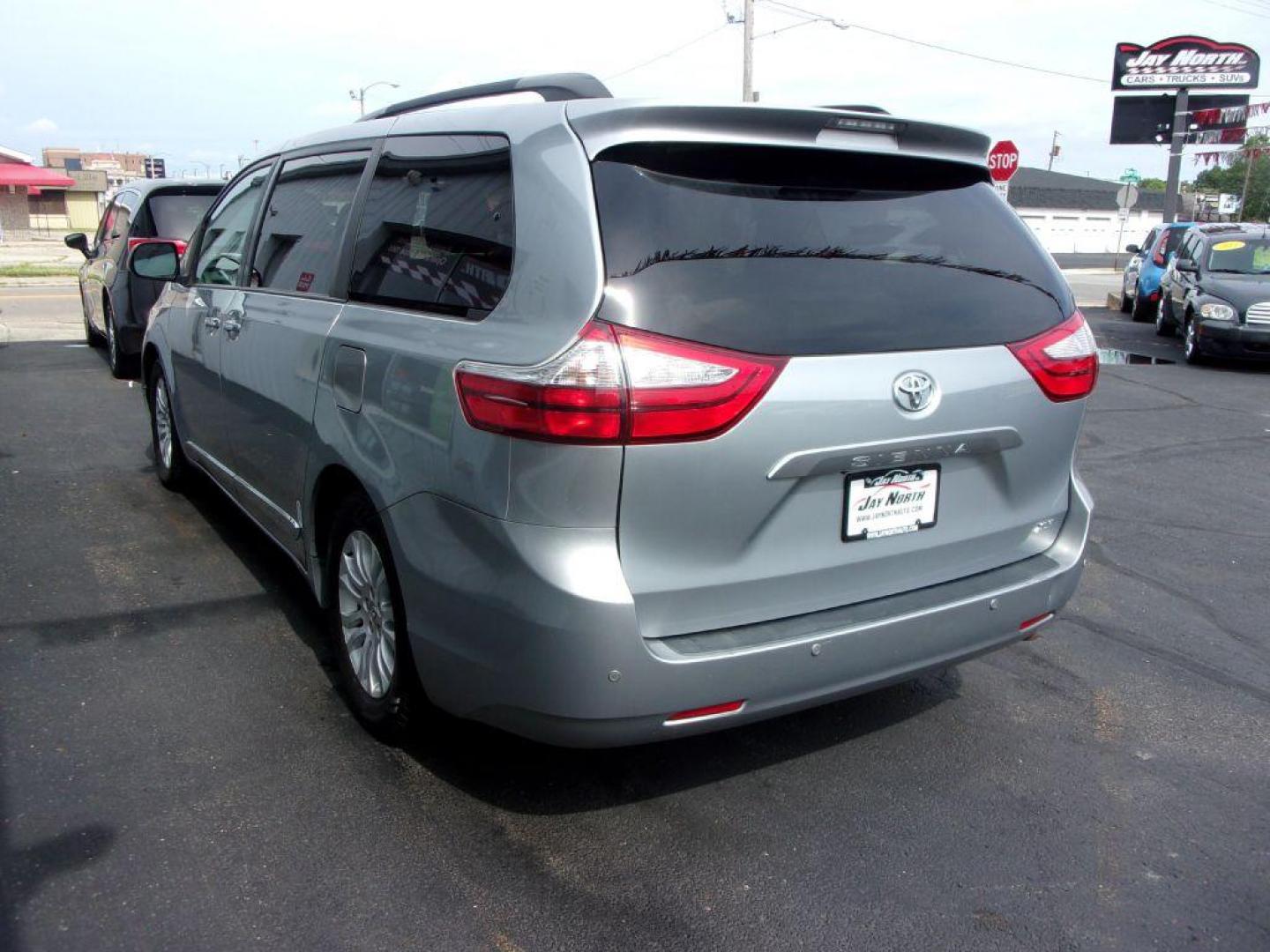 2015 GRAY TOYOTA SIENNA XLE (5TDYK3DC4FS) with an 3.5L engine, Automatic transmission, located at 501 E. Columbia St., Springfield, OH, 45503, (800) 262-7122, 39.925262, -83.801796 - ***1-Owner***Clean Carfax***XLE***Heated Leather Seating***Runroof***Captians Chairs***Power Doors***New Front Pads and Rotors***Serviced and Detailed*** Jay North Auto has offered hand picked vehicles since 1965! Our customer's enjoy a NO pressure buying experience with a small town feel. All o - Photo#5