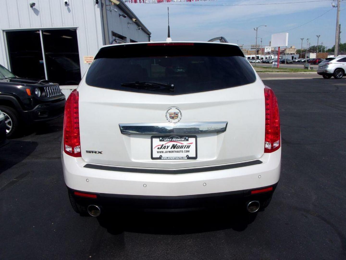 2010 WHITE CADILLAC SRX LUXURY COLLECTION (3GYFNAEY6AS) with an 3.0L engine, Automatic transmission, located at 501 E. Columbia St., Springfield, OH, 45503, (800) 262-7122, 39.925262, -83.801796 - ***Clean Carfax***SHARP***Lux Collection***Dual Moonroof***Heated Leather Seating***Power Lift Gate***Serviced and Detailed*** Jay North Auto has offered hand picked vehicles since 1965! Our customer's enjoy a NO pressure buying experience with a small town feel. All of our vehicles get fully in - Photo#4