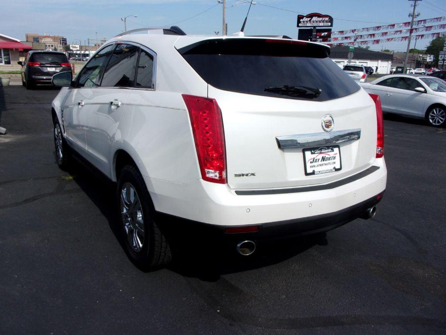 2010 WHITE CADILLAC SRX LUXURY COLLECTION (3GYFNAEY6AS) with an 3.0L engine, Automatic transmission, located at 501 E. Columbia St., Springfield, OH, 45503, (800) 262-7122, 39.925262, -83.801796 - ***Clean Carfax***SHARP***Lux Collection***Dual Moonroof***Heated Leather Seating***Power Lift Gate***Serviced and Detailed*** Jay North Auto has offered hand picked vehicles since 1965! Our customer's enjoy a NO pressure buying experience with a small town feel. All of our vehicles get fully in - Photo#5