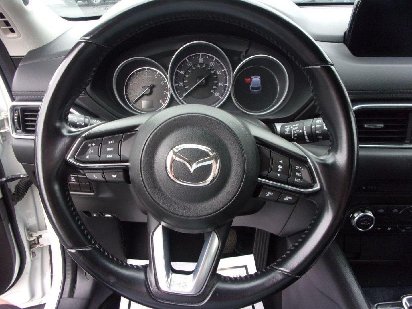 2018 WHITE MAZDA CX-5 TOURING (JM3KFBCM5J0) with an 2.5L engine, Automatic transmission, located at 501 E. Columbia St., Springfield, OH, 45503, (800) 262-7122, 39.925262, -83.801796 - ***LOADED***Heated Seating***TOURING***AWD***Power Liftgate***Moonroof***Serviced and Detailed*** Jay North Auto has offered hand picked vehicles since 1965! Our customer's enjoy a NO pressure buying experience with a small town feel. All of our vehicles get fully inspected and detailed. We are - Photo#9