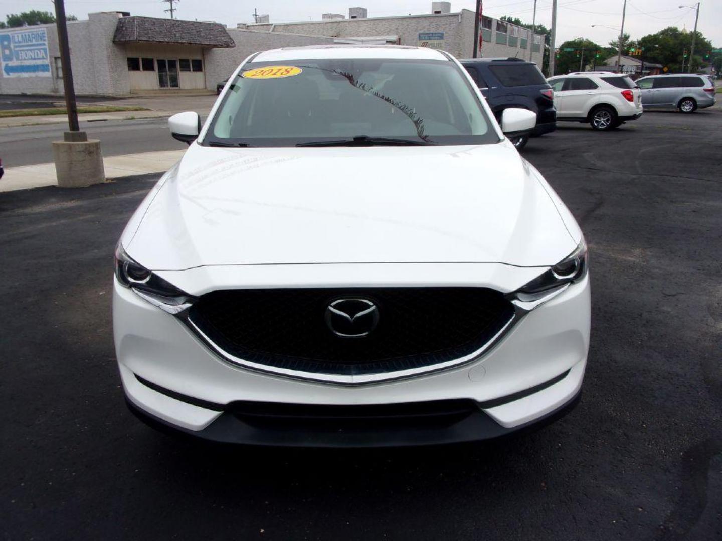 2018 WHITE MAZDA CX-5 TOURING (JM3KFBCM5J0) with an 2.5L engine, Automatic transmission, located at 501 E. Columbia St., Springfield, OH, 45503, (800) 262-7122, 39.925262, -83.801796 - ***LOADED***Heated Seating***TOURING***AWD***Power Liftgate***Moonroof***Serviced and Detailed*** Jay North Auto has offered hand picked vehicles since 1965! Our customer's enjoy a NO pressure buying experience with a small town feel. All of our vehicles get fully inspected and detailed. We are - Photo#1