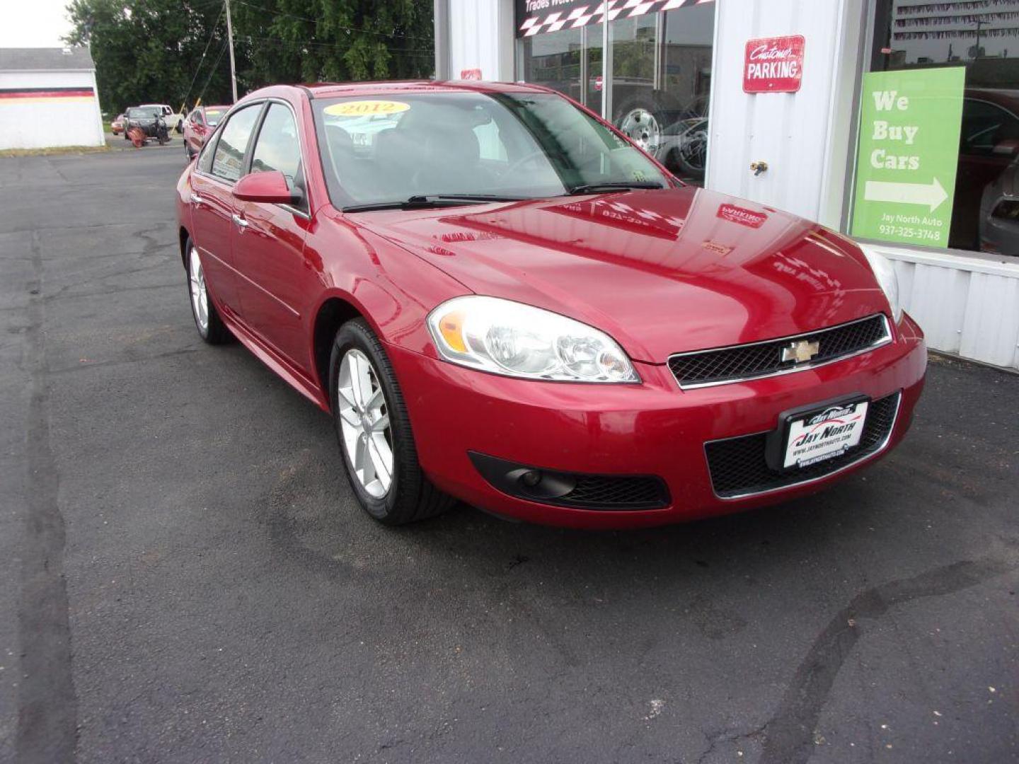 2012 RED CHEVROLET IMPALA LTZ (2G1WC5E38C1) with an 3.6L engine, Automatic transmission, located at 501 E. Columbia St., Springfield, OH, 45503, (800) 262-7122, 39.925262, -83.801796 - ***LOEADED***Heated Leather Seating***LTZ***Moonroof***Remote Start***Serviced and Detailed*** Jay North Auto has offered hand picked vehicles since 1965! Our customer's enjoy a NO pressure buying experience with a small town feel. All of our vehicles get fully inspected and detailed. We are a p - Photo#2