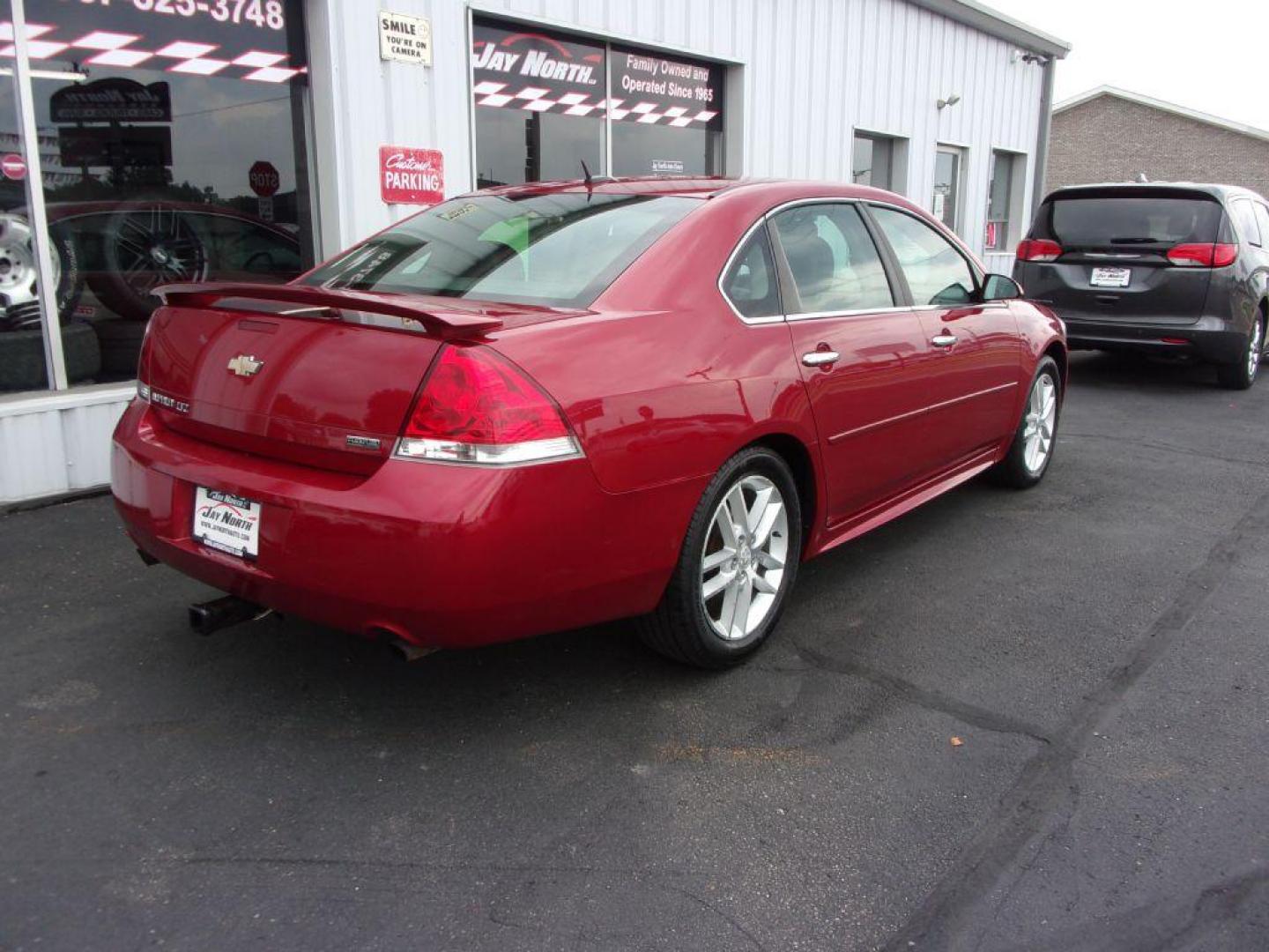 2012 RED CHEVROLET IMPALA LTZ (2G1WC5E38C1) with an 3.6L engine, Automatic transmission, located at 501 E. Columbia St., Springfield, OH, 45503, (800) 262-7122, 39.925262, -83.801796 - ***LOEADED***Heated Leather Seating***LTZ***Moonroof***Remote Start***Serviced and Detailed*** Jay North Auto has offered hand picked vehicles since 1965! Our customer's enjoy a NO pressure buying experience with a small town feel. All of our vehicles get fully inspected and detailed. We are a p - Photo#3