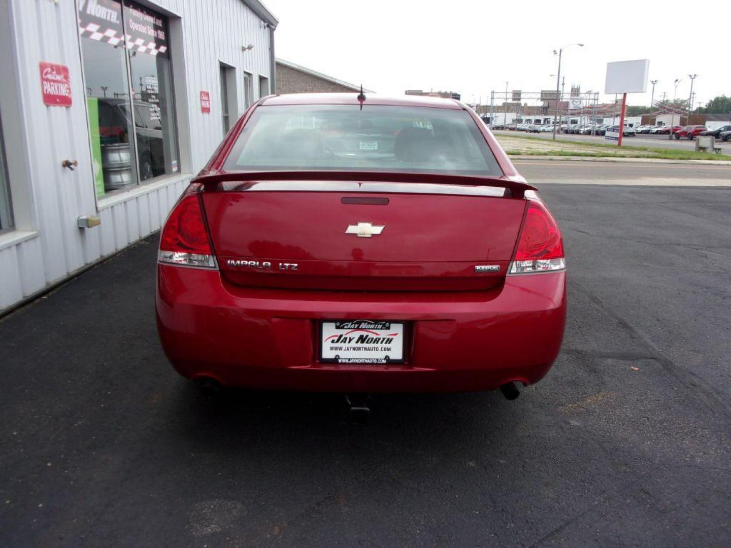 2012 RED CHEVROLET IMPALA LTZ (2G1WC5E38C1) with an 3.6L engine, Automatic transmission, located at 501 E. Columbia St., Springfield, OH, 45503, (800) 262-7122, 39.925262, -83.801796 - ***LOEADED***Heated Leather Seating***LTZ***Moonroof***Remote Start***Serviced and Detailed*** Jay North Auto has offered hand picked vehicles since 1965! Our customer's enjoy a NO pressure buying experience with a small town feel. All of our vehicles get fully inspected and detailed. We are a p - Photo#4