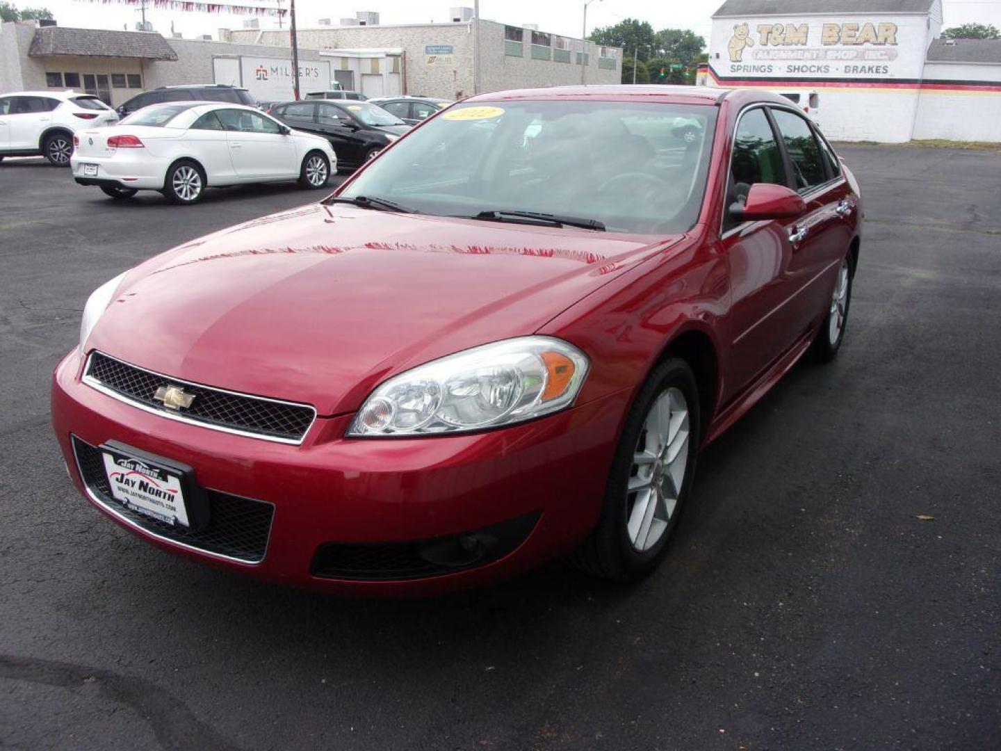 2012 RED CHEVROLET IMPALA LTZ (2G1WC5E38C1) with an 3.6L engine, Automatic transmission, located at 501 E. Columbia St., Springfield, OH, 45503, (800) 262-7122, 39.925262, -83.801796 - ***LOEADED***Heated Leather Seating***LTZ***Moonroof***Remote Start***Serviced and Detailed*** Jay North Auto has offered hand picked vehicles since 1965! Our customer's enjoy a NO pressure buying experience with a small town feel. All of our vehicles get fully inspected and detailed. We are a p - Photo#6