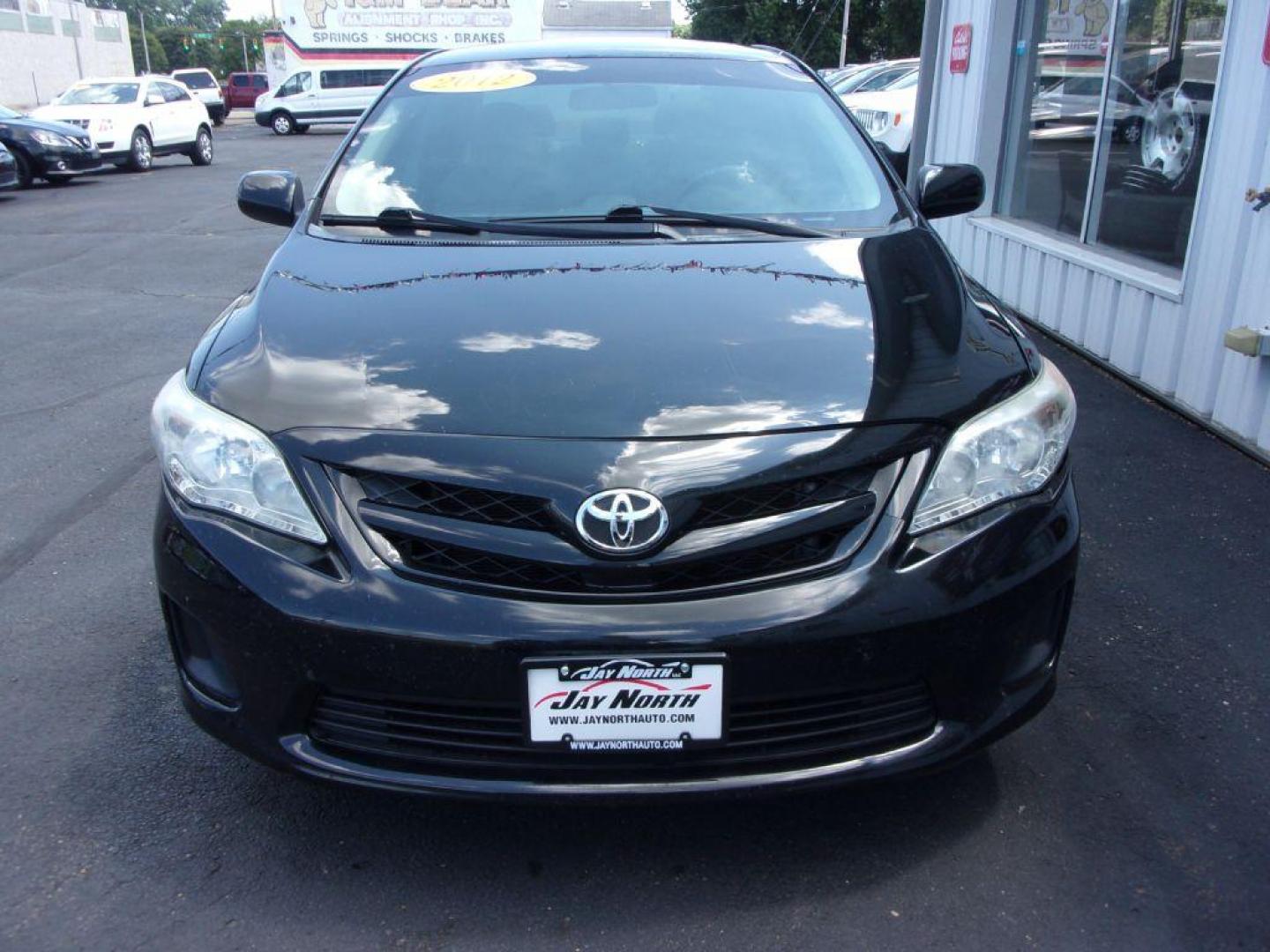 2012 BLACK TOYOTA COROLLA LE (2T1BU4EE5CC) with an 1.8L engine, Automatic transmission, located at 501 E. Columbia St., Springfield, OH, 45503, (800) 262-7122, 39.925262, -83.801796 - Photo#2