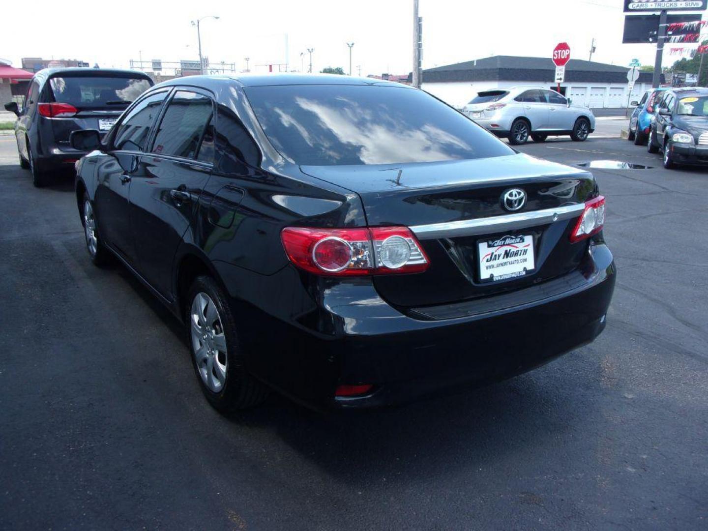 2012 BLACK TOYOTA COROLLA LE (2T1BU4EE5CC) with an 1.8L engine, Automatic transmission, located at 501 E. Columbia St., Springfield, OH, 45503, (800) 262-7122, 39.925262, -83.801796 - Photo#5