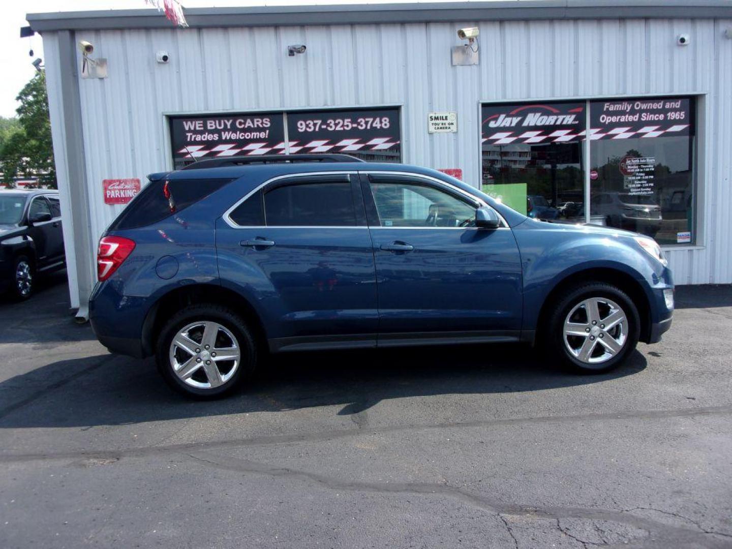 2016 BLUE CHEVROLET EQUINOX LT (2GNFLFEK3G6) with an 2.4L engine, Automatic transmission, located at 501 E. Columbia St., Springfield, OH, 45503, (800) 262-7122, 39.925262, -83.801796 - *** LT *** AWD *** Moonroof *** Pioneer Audio *** Serviced and Detailed *** Jay North Auto has offered hand picked vehicles since 1965! Our customer's enjoy a NO pressure buying experience with a small town feel. All of our vehicles get fully inspected and detailed. We are a preferred dealer fo - Photo#0