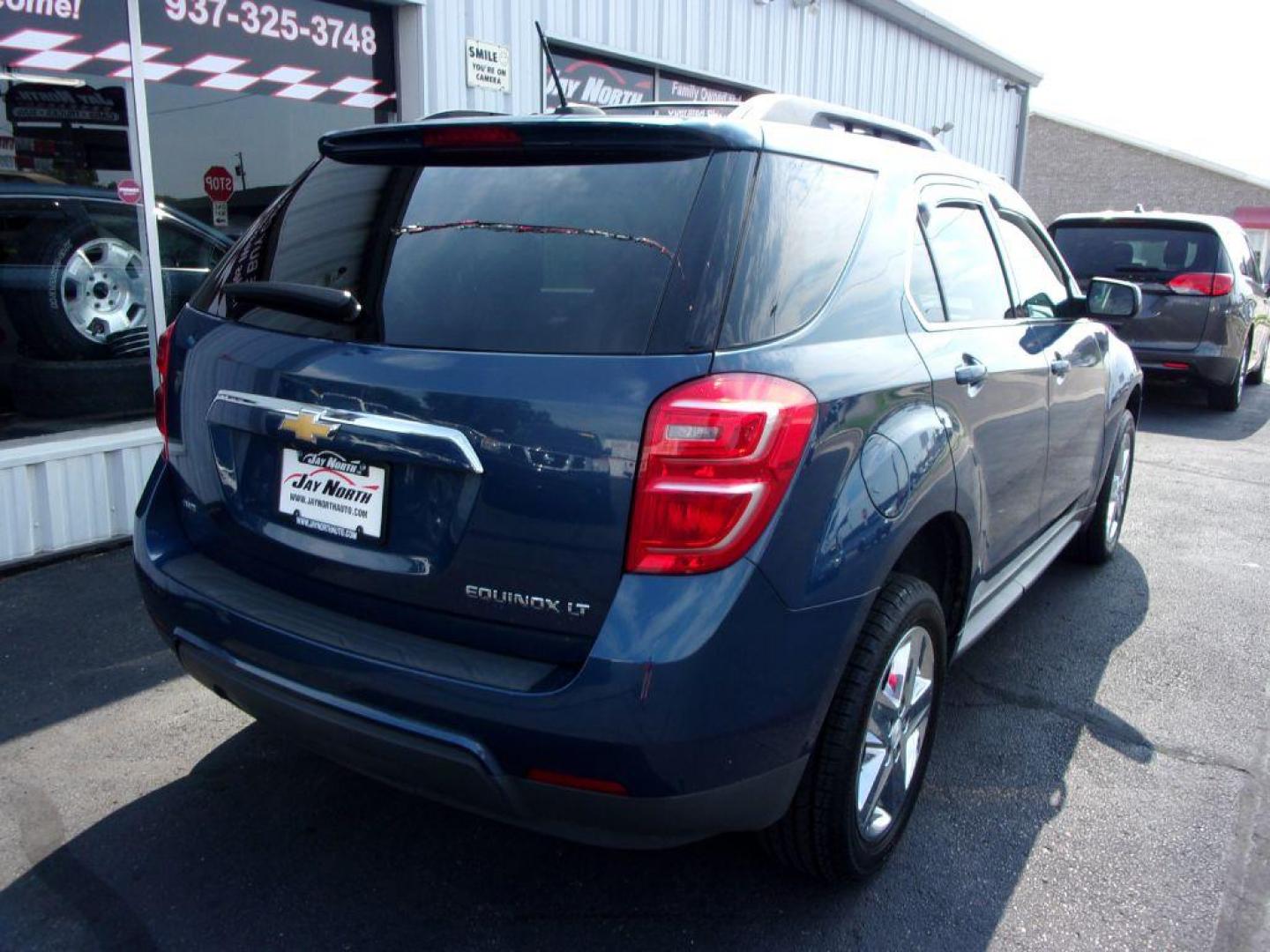 2016 BLUE CHEVROLET EQUINOX LT (2GNFLFEK3G6) with an 2.4L engine, Automatic transmission, located at 501 E. Columbia St., Springfield, OH, 45503, (800) 262-7122, 39.925262, -83.801796 - *** LT *** AWD *** Moonroof *** Pioneer Audio *** Serviced and Detailed *** Jay North Auto has offered hand picked vehicles since 1965! Our customer's enjoy a NO pressure buying experience with a small town feel. All of our vehicles get fully inspected and detailed. We are a preferred dealer fo - Photo#3