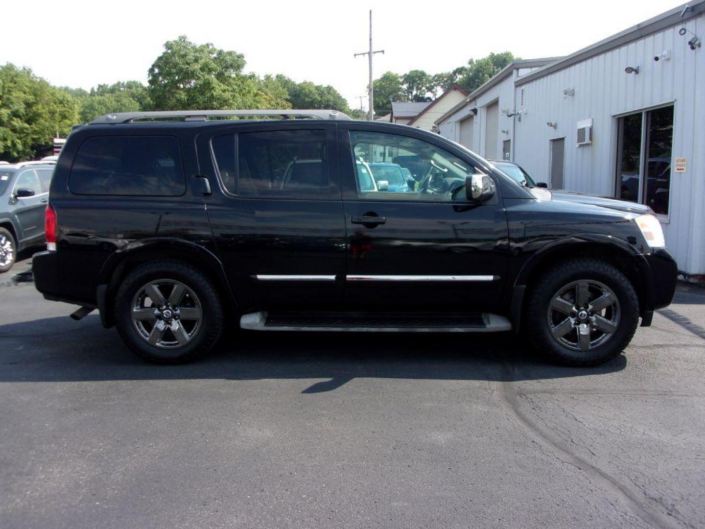 2014 BLACK NISSAN ARMADA PLATINUM RESERVE (5N1BA0NE4EN) with an 5.6L engine, Automatic transmission, located at 501 E. Columbia St., Springfield, OH, 45503, (800) 262-7122, 39.925262, -83.801796 - *** Platinum Reserve *** 4x4 5.6L V8 *** Bose 11 Speaker Audio w/ Navigation *** 2 Row Captain Seating *** Back Up Camera *** 20 inch Black Chrome Wheels *** Serviced and Detailed *** LOADED *** NICE *** DVD *** Jay North Auto has offered hand picked vehicles since 1965! Our customer's enjoy a N - Photo#0