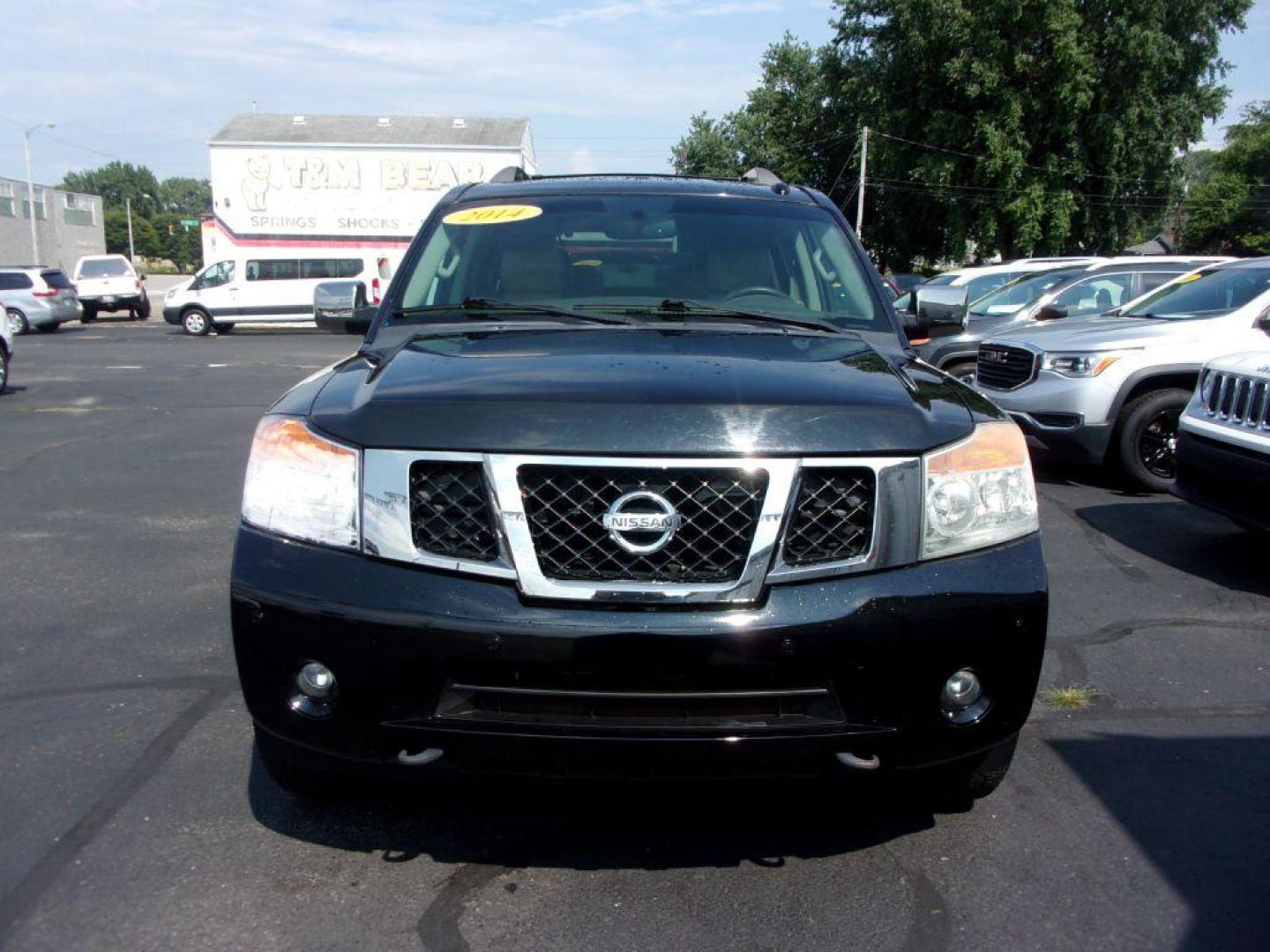 2014 BLACK NISSAN ARMADA PLATINUM RESERVE (5N1BA0NE4EN) with an 5.6L engine, Automatic transmission, located at 501 E. Columbia St., Springfield, OH, 45503, (800) 262-7122, 39.925262, -83.801796 - *** Platinum Reserve *** 4x4 5.6L V8 *** Bose 11 Speaker Audio w/ Navigation *** 2 Row Captain Seating *** Back Up Camera *** 20 inch Black Chrome Wheels *** Serviced and Detailed *** LOADED *** NICE *** DVD *** Jay North Auto has offered hand picked vehicles since 1965! Our customer's enjoy a N - Photo#1