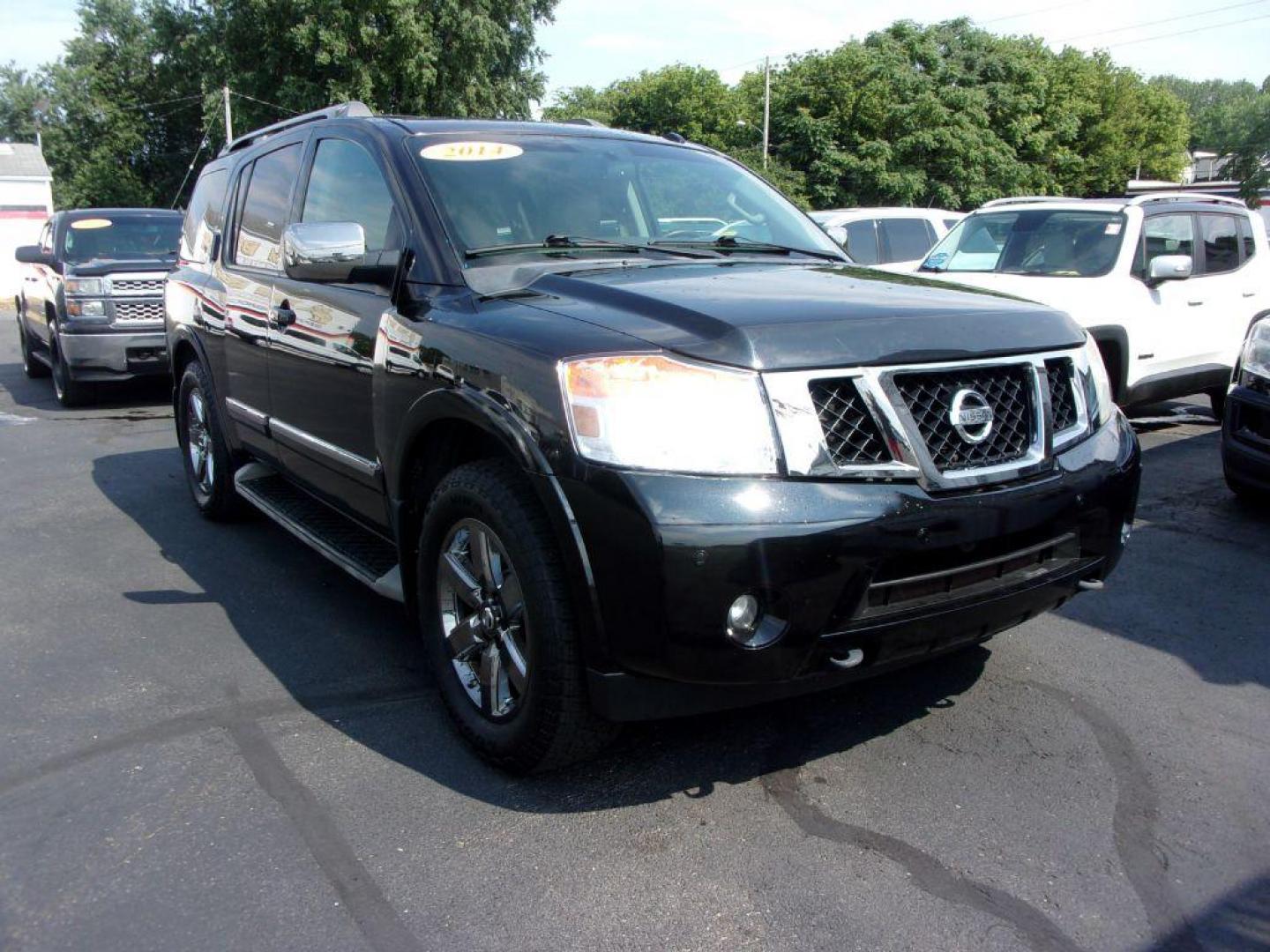 2014 BLACK NISSAN ARMADA PLATINUM RESERVE (5N1BA0NE4EN) with an 5.6L engine, Automatic transmission, located at 501 E. Columbia St., Springfield, OH, 45503, (800) 262-7122, 39.925262, -83.801796 - *** Platinum Reserve *** 4x4 5.6L V8 *** Bose 11 Speaker Audio w/ Navigation *** 2 Row Captain Seating *** Back Up Camera *** 20 inch Black Chrome Wheels *** Serviced and Detailed *** LOADED *** NICE *** DVD *** Jay North Auto has offered hand picked vehicles since 1965! Our customer's enjoy a N - Photo#2