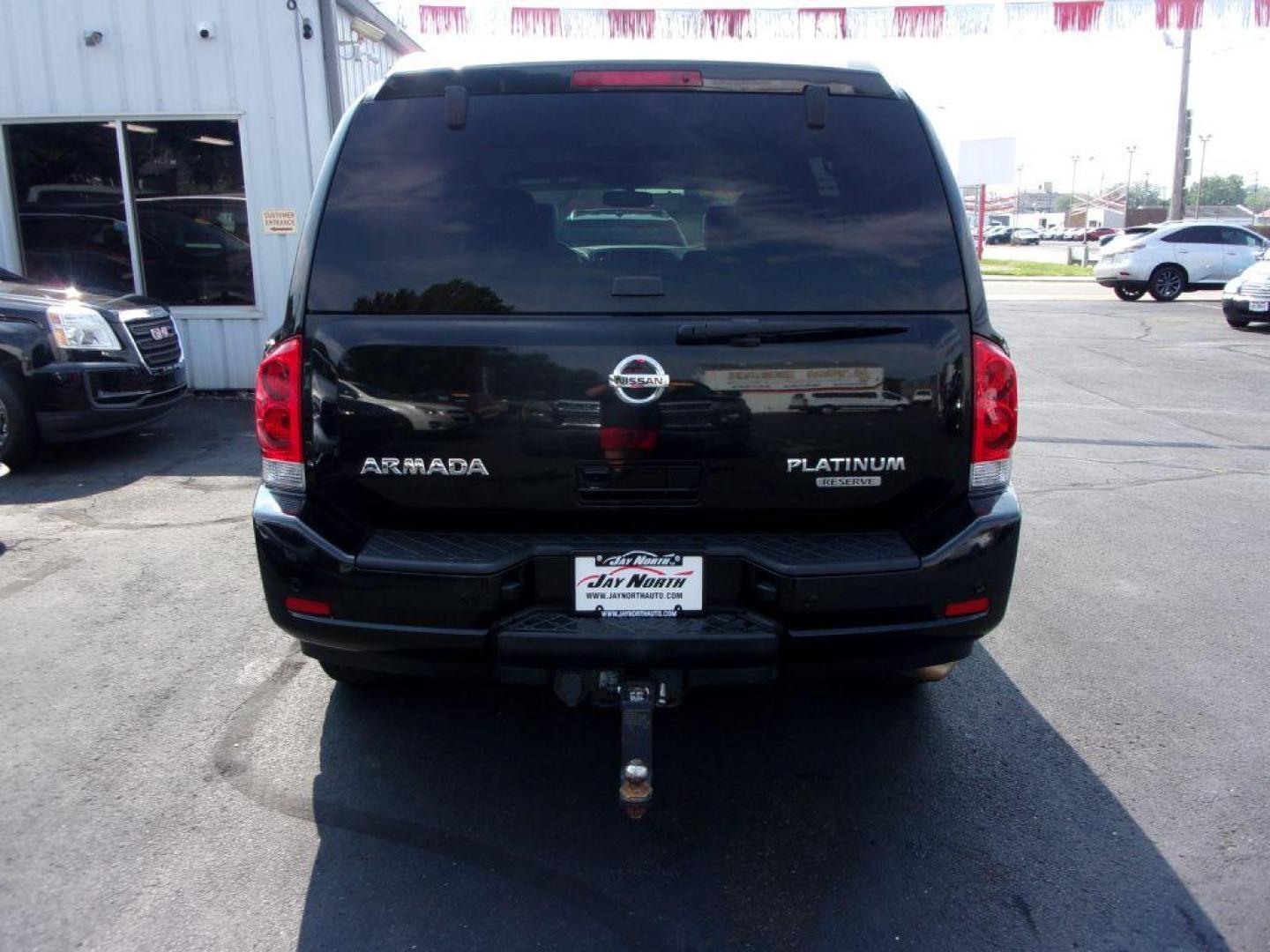 2014 BLACK NISSAN ARMADA PLATINUM RESERVE (5N1BA0NE4EN) with an 5.6L engine, Automatic transmission, located at 501 E. Columbia St., Springfield, OH, 45503, (800) 262-7122, 39.925262, -83.801796 - *** Platinum Reserve *** 4x4 5.6L V8 *** Bose 11 Speaker Audio w/ Navigation *** 2 Row Captain Seating *** Back Up Camera *** 20 inch Black Chrome Wheels *** Serviced and Detailed *** LOADED *** NICE *** DVD *** Jay North Auto has offered hand picked vehicles since 1965! Our customer's enjoy a N - Photo#4