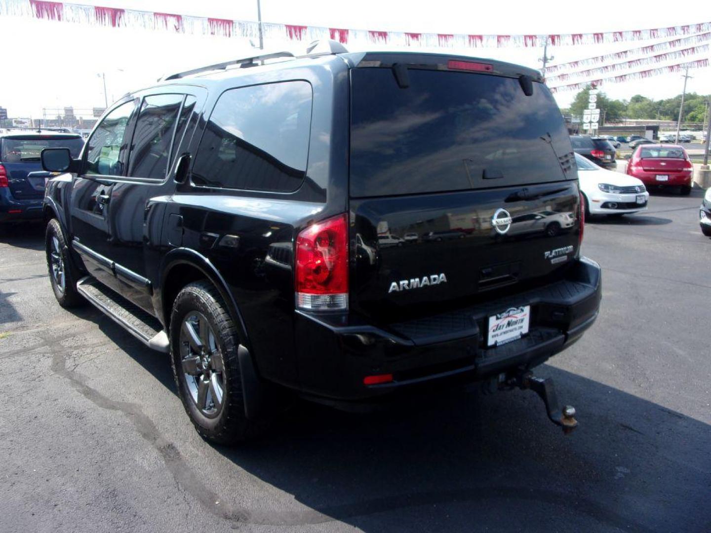 2014 BLACK NISSAN ARMADA PLATINUM RESERVE (5N1BA0NE4EN) with an 5.6L engine, Automatic transmission, located at 501 E. Columbia St., Springfield, OH, 45503, (800) 262-7122, 39.925262, -83.801796 - *** Platinum Reserve *** 4x4 5.6L V8 *** Bose 11 Speaker Audio w/ Navigation *** 2 Row Captain Seating *** Back Up Camera *** 20 inch Black Chrome Wheels *** Serviced and Detailed *** LOADED *** NICE *** DVD *** Jay North Auto has offered hand picked vehicles since 1965! Our customer's enjoy a N - Photo#5