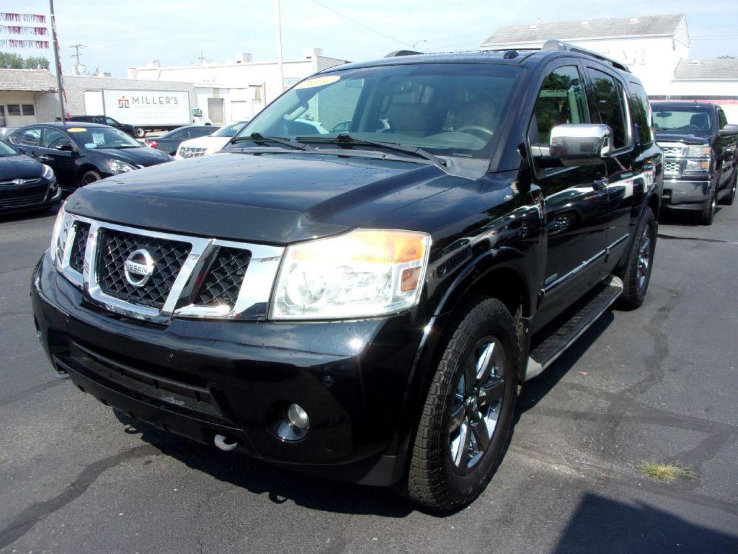 2014 BLACK NISSAN ARMADA PLATINUM RESERVE (5N1BA0NE4EN) with an 5.6L engine, Automatic transmission, located at 501 E. Columbia St., Springfield, OH, 45503, (800) 262-7122, 39.925262, -83.801796 - *** Platinum Reserve *** 4x4 5.6L V8 *** Bose 11 Speaker Audio w/ Navigation *** 2 Row Captain Seating *** Back Up Camera *** 20 inch Black Chrome Wheels *** Serviced and Detailed *** LOADED *** NICE *** DVD *** Jay North Auto has offered hand picked vehicles since 1965! Our customer's enjoy a N - Photo#6