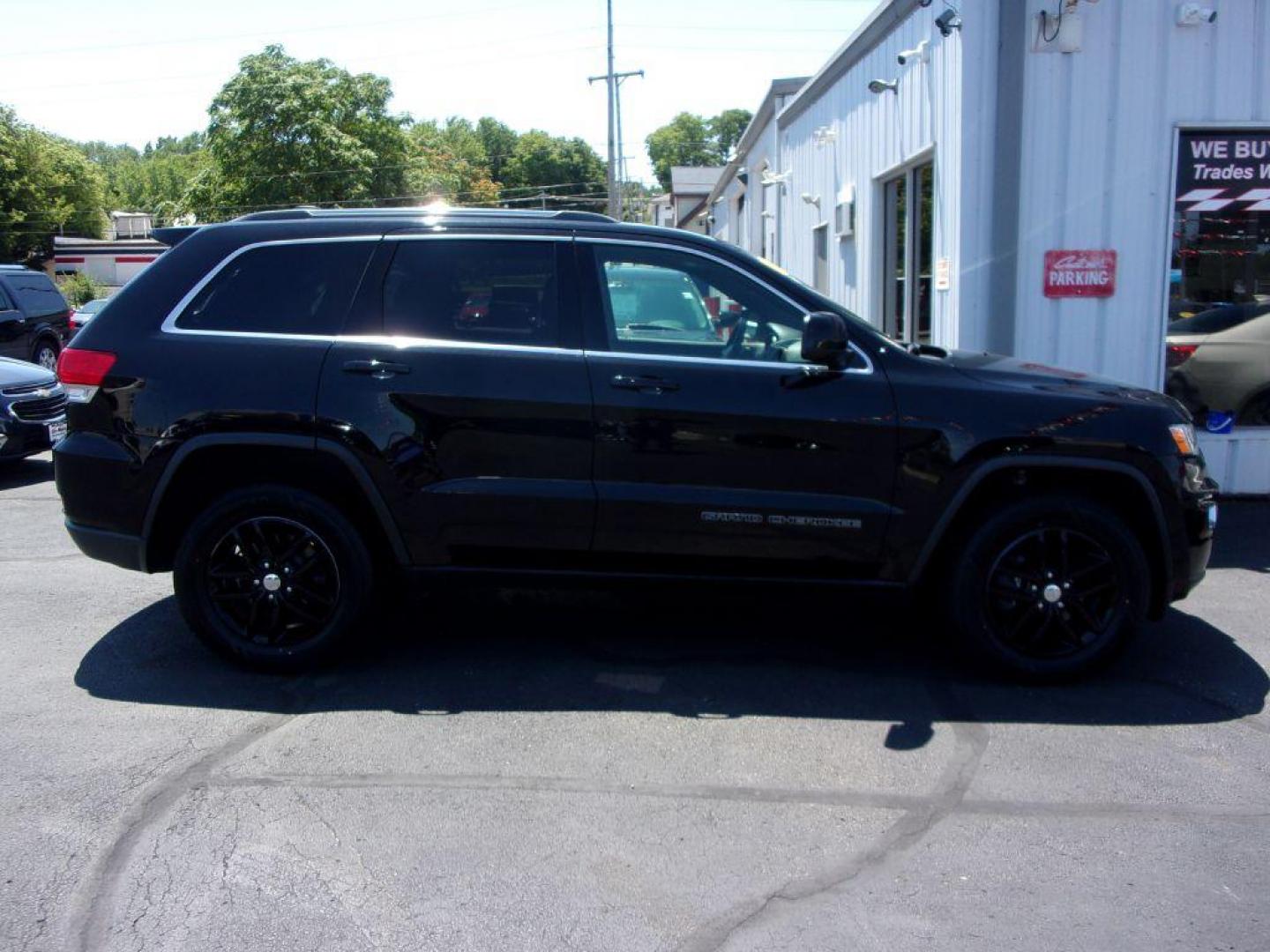 2017 BLACK JEEP GRAND CHEROKEE LAREDO (1C4RJFAG9HC) with an 3.6L engine, Automatic transmission, located at 501 E. Columbia St., Springfield, OH, 45503, (800) 262-7122, 39.925262, -83.801796 - Photo#0