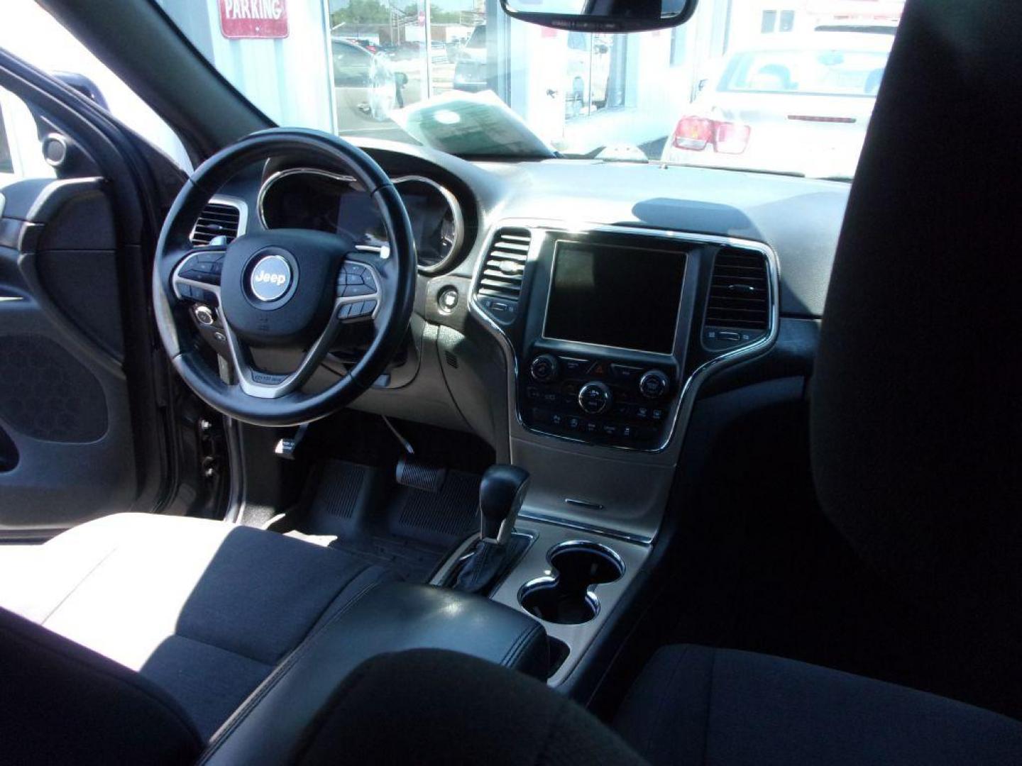 2017 BLACK JEEP GRAND CHEROKEE LAREDO (1C4RJFAG9HC) with an 3.6L engine, Automatic transmission, located at 501 E. Columbia St., Springfield, OH, 45503, (800) 262-7122, 39.925262, -83.801796 - *** New Tires *** Serviced and Detailed *** 4x4 V6 *** NICE!!! *** OPTIONAL EQUIPMENT Customer Preferred Package 23E $2,000 Bright Side Roof Rails Power 4-Way Driver Lumbar Adjust Power 8-Way Driver Seat / Manual Passenger Seat 18-Inch Wheel and 8.4-Inch Radio Group $1,795 18-Inch x 8-Inch - Photo#16