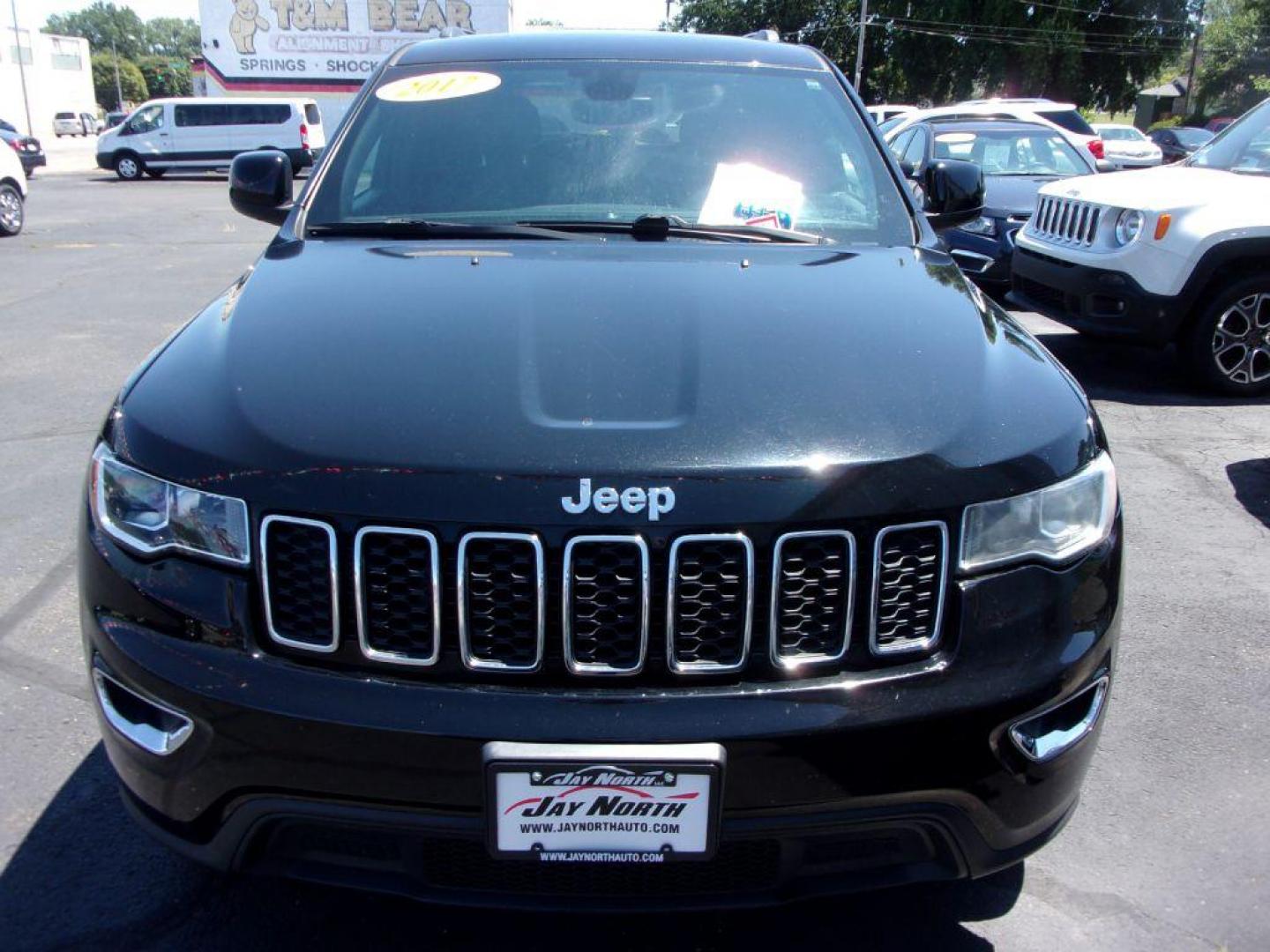 2017 BLACK JEEP GRAND CHEROKEE LAREDO (1C4RJFAG9HC) with an 3.6L engine, Automatic transmission, located at 501 E. Columbia St., Springfield, OH, 45503, (800) 262-7122, 39.925262, -83.801796 - *** New Tires *** Serviced and Detailed *** 4x4 V6 *** NICE!!! *** OPTIONAL EQUIPMENT Customer Preferred Package 23E $2,000 Bright Side Roof Rails Power 4-Way Driver Lumbar Adjust Power 8-Way Driver Seat / Manual Passenger Seat 18-Inch Wheel and 8.4-Inch Radio Group $1,795 18-Inch x 8-Inch - Photo#2