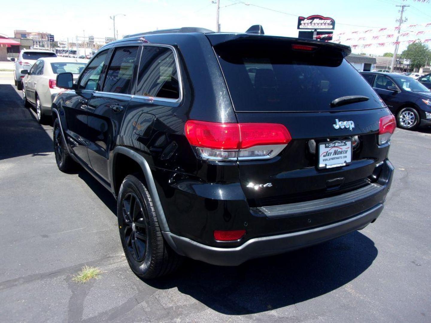 2017 BLACK JEEP GRAND CHEROKEE LAREDO (1C4RJFAG9HC) with an 3.6L engine, Automatic transmission, located at 501 E. Columbia St., Springfield, OH, 45503, (800) 262-7122, 39.925262, -83.801796 - Photo#4