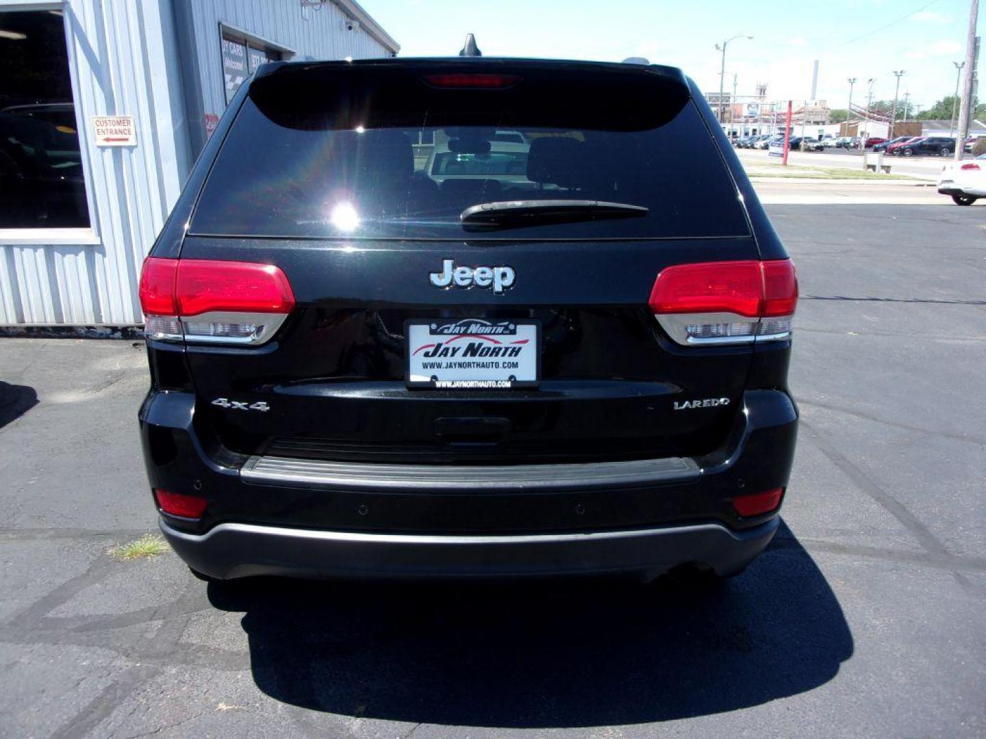 2017 BLACK JEEP GRAND CHEROKEE LAREDO (1C4RJFAG9HC) with an 3.6L engine, Automatic transmission, located at 501 E. Columbia St., Springfield, OH, 45503, (800) 262-7122, 39.925262, -83.801796 - Photo#5