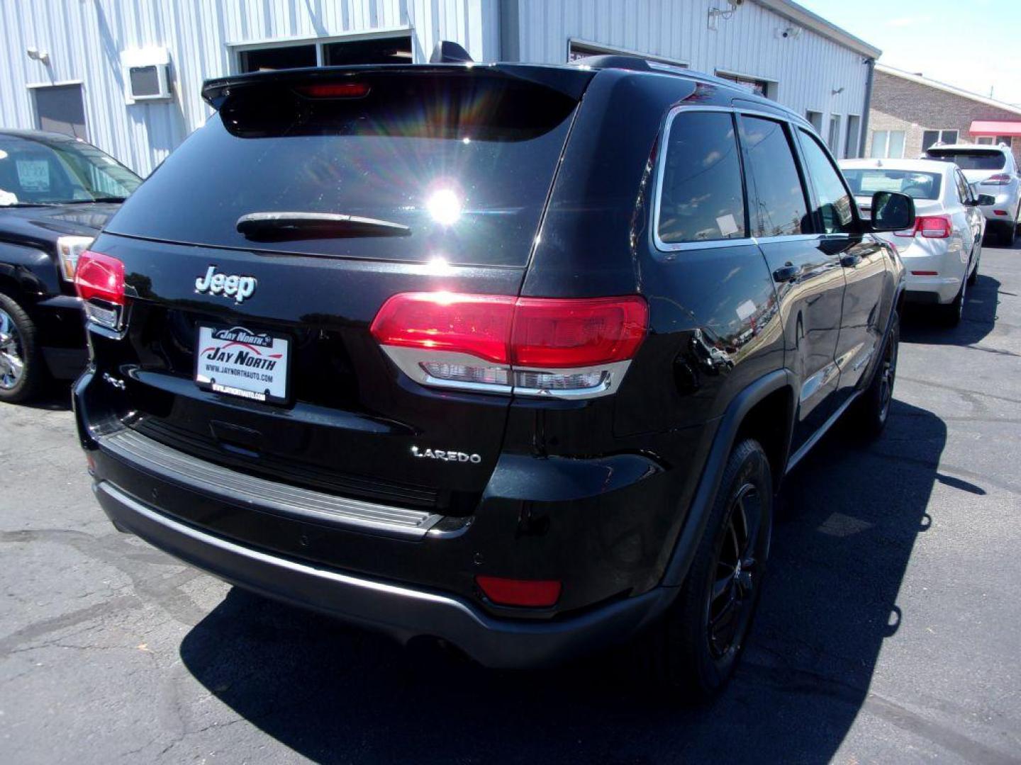 2017 BLACK JEEP GRAND CHEROKEE LAREDO (1C4RJFAG9HC) with an 3.6L engine, Automatic transmission, located at 501 E. Columbia St., Springfield, OH, 45503, (800) 262-7122, 39.925262, -83.801796 - *** New Tires *** Serviced and Detailed *** 4x4 V6 *** NICE!!! *** OPTIONAL EQUIPMENT Customer Preferred Package 23E $2,000 Bright Side Roof Rails Power 4-Way Driver Lumbar Adjust Power 8-Way Driver Seat / Manual Passenger Seat 18-Inch Wheel and 8.4-Inch Radio Group $1,795 18-Inch x 8-Inch - Photo#6