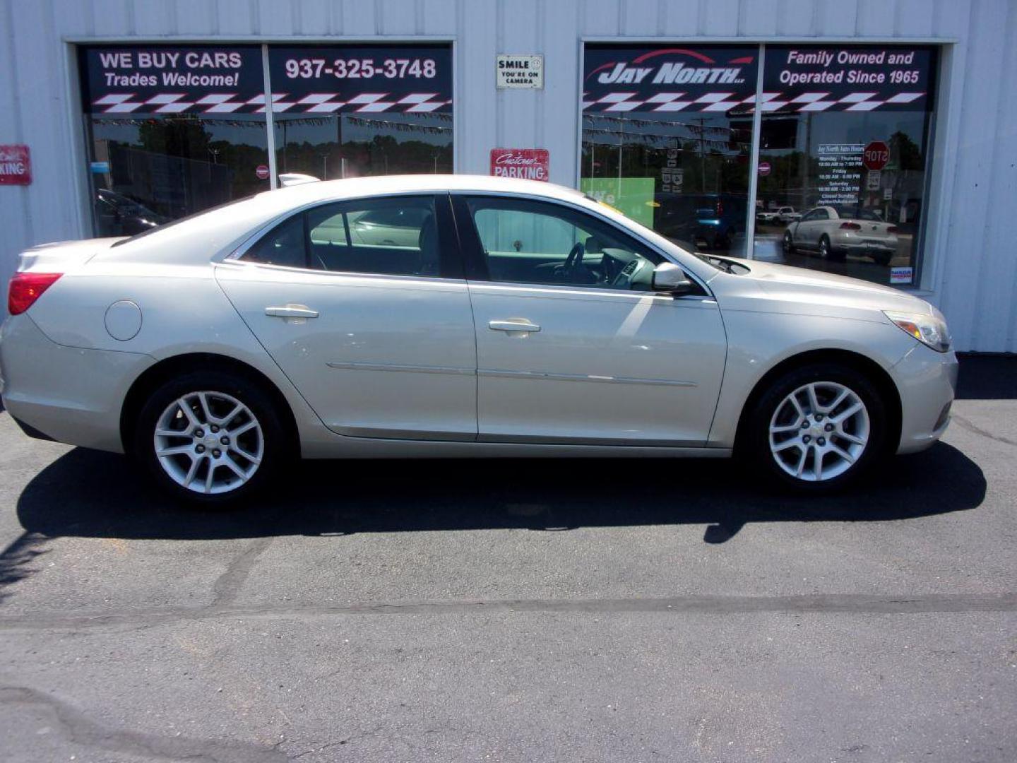 2015 GOLD CHEVROLET MALIBU 1LT (1G11C5SL0FF) with an 2.5L engine, Automatic transmission, located at 501 E. Columbia St., Springfield, OH, 45503, (800) 262-7122, 39.925262, -83.801796 - Photo#0