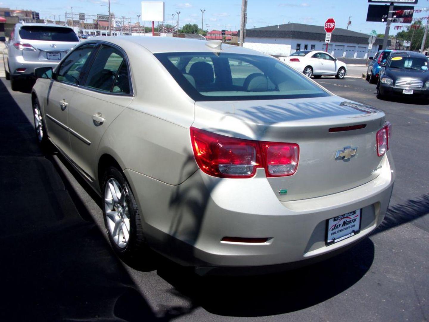 2015 GOLD CHEVROLET MALIBU 1LT (1G11C5SL0FF) with an 2.5L engine, Automatic transmission, located at 501 E. Columbia St., Springfield, OH, 45503, (800) 262-7122, 39.925262, -83.801796 - *** New Tires *** Serviced and Detailed *** Well Maintained w/ 19 service records on Clean CarFax *** Jay North Auto has offered hand picked vehicles since 1965! Our customer's enjoy a NO pressure buying experience with a small town feel. All of our vehicles get fully inspected and detailed. We - Photo#5