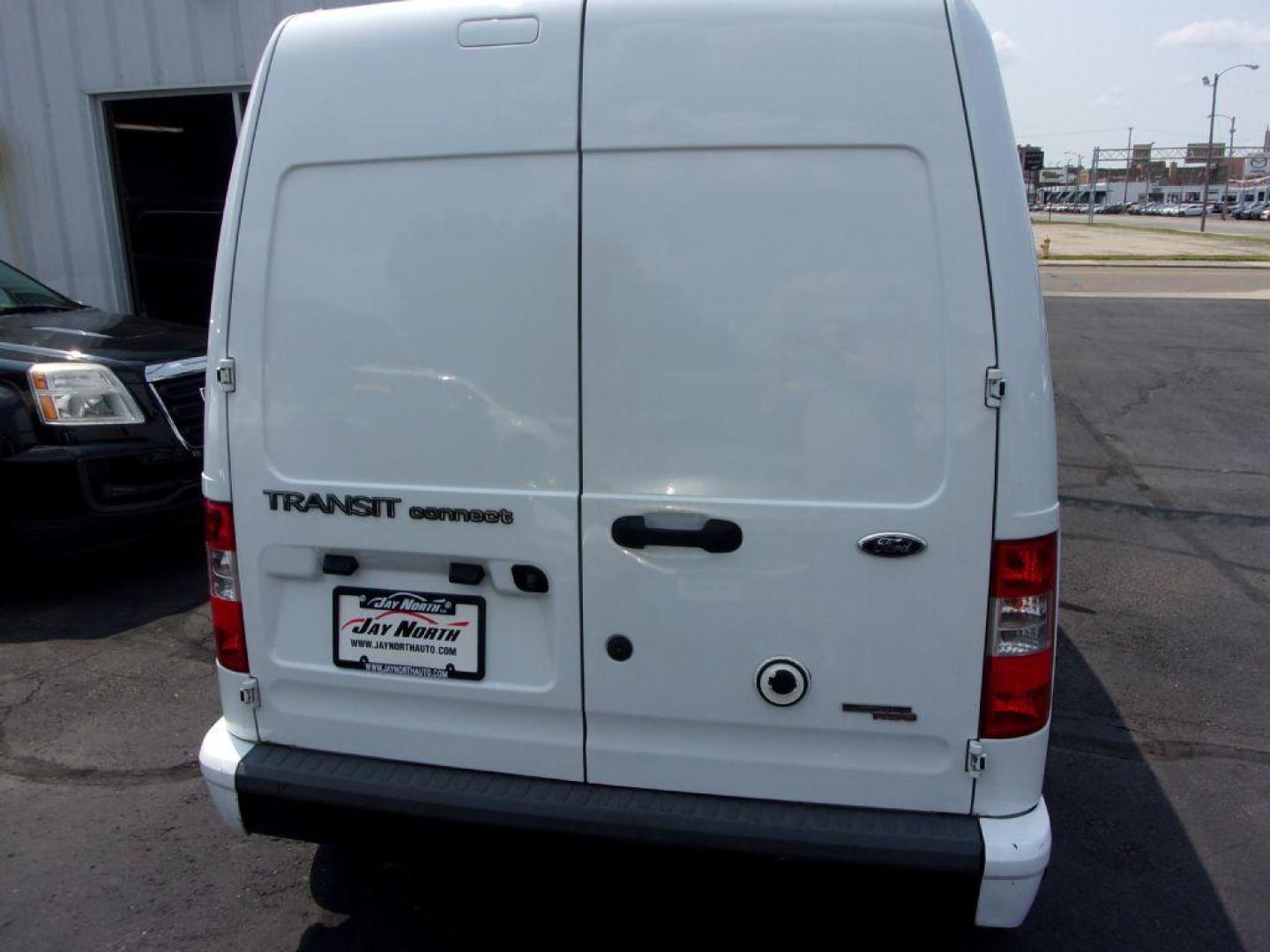 2013 WHITE FORD TRANSIT CONNECT XLT (NM0LS7BN8DT) with an 2.0L engine, Automatic transmission, located at 501 E. Columbia St., Springfield, OH, 45503, (800) 262-7122, 39.925262, -83.801796 - *** 1 Owner *** Serviced and Detailed *** XLT *** Jay North Auto has offered hand picked vehicles since 1965! Our customer's enjoy a NO pressure buying experience with a small town feel. All of our vehicles get fully inspected and detailed. We are a preferred dealer for many local credit unions - Photo#4