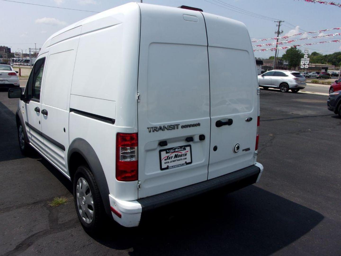 2013 WHITE FORD TRANSIT CONNECT XLT (NM0LS7BN8DT) with an 2.0L engine, Automatic transmission, located at 501 E. Columbia St., Springfield, OH, 45503, (800) 262-7122, 39.925262, -83.801796 - *** 1 Owner *** Serviced and Detailed *** XLT *** Jay North Auto has offered hand picked vehicles since 1965! Our customer's enjoy a NO pressure buying experience with a small town feel. All of our vehicles get fully inspected and detailed. We are a preferred dealer for many local credit unions - Photo#5