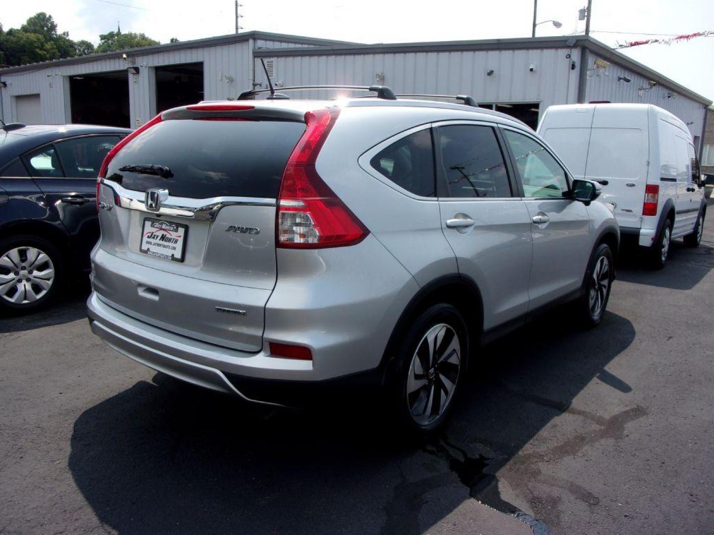 2015 SILVER HONDA CR-V TOURING (5J6RM4H92FL) with an 2.4L engine, Continuously Variable transmission, located at 501 E. Columbia St., Springfield, OH, 45503, (800) 262-7122, 39.925262, -83.801796 - *** 1 Owner Clean CarFax *** Updated Timing Chain and Phaser *** New Tires *** EX-L *** Touring *** AWD *** Back Up Camera *** Moonroof *** Loaded *** Jay North Auto has offered hand picked vehicles since 1965! Our customer's enjoy a NO pressure buying experience with a small town feel. All of - Photo#3