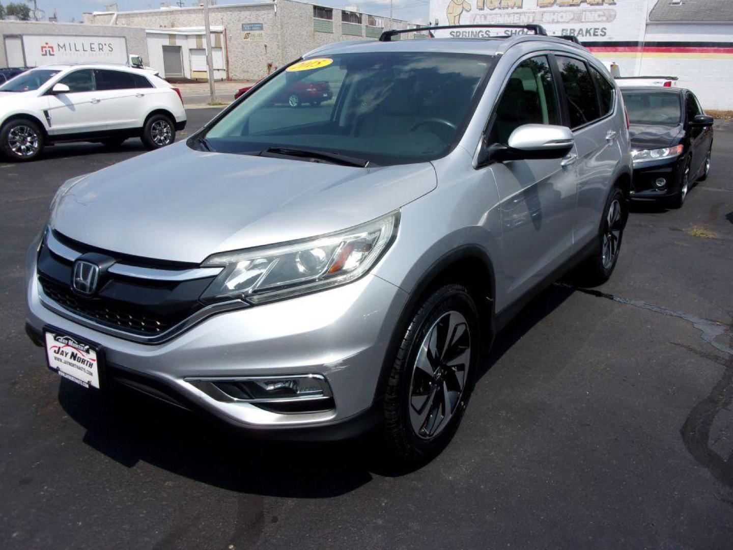 2015 SILVER HONDA CR-V TOURING (5J6RM4H92FL) with an 2.4L engine, Continuously Variable transmission, located at 501 E. Columbia St., Springfield, OH, 45503, (800) 262-7122, 39.925262, -83.801796 - *** 1 Owner Clean CarFax *** Updated Timing Chain and Phaser *** New Tires *** EX-L *** Touring *** AWD *** Back Up Camera *** Moonroof *** Loaded *** Jay North Auto has offered hand picked vehicles since 1965! Our customer's enjoy a NO pressure buying experience with a small town feel. All of - Photo#6