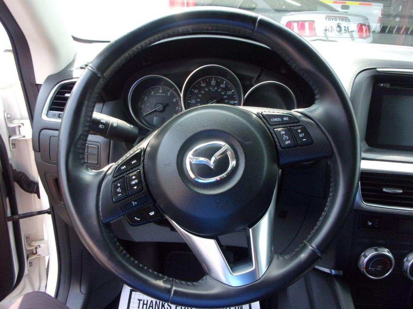 2016 WHITE MAZDA CX-5 TOURING (JM3KE4CY5G0) with an 2.5L engine, Automatic transmission, located at 501 E. Columbia St., Springfield, OH, 45503, (800) 262-7122, 39.925262, -83.801796 - *** New Tires *** Serviced and Detailed *** Moonroof *** Back Up Camera *** Touring *** AWD *** Jay North Auto has offered hand picked vehicles since 1965! Our customer's enjoy a NO pressure buying experience with a small town feel. All of our vehicles get fully inspected and detailed. We are a - Photo#9