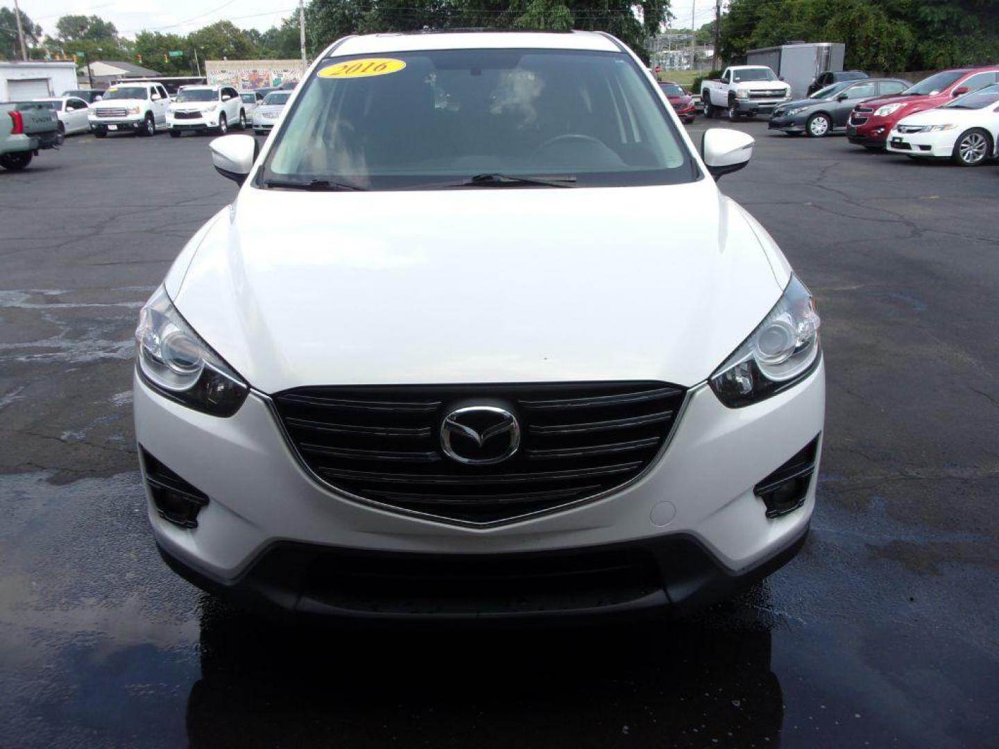 2016 WHITE MAZDA CX-5 TOURING (JM3KE4CY5G0) with an 2.5L engine, Automatic transmission, located at 501 E. Columbia St., Springfield, OH, 45503, (800) 262-7122, 39.925262, -83.801796 - *** New Tires *** Serviced and Detailed *** Moonroof *** Back Up Camera *** Touring *** AWD *** Jay North Auto has offered hand picked vehicles since 1965! Our customer's enjoy a NO pressure buying experience with a small town feel. All of our vehicles get fully inspected and detailed. We are a - Photo#1