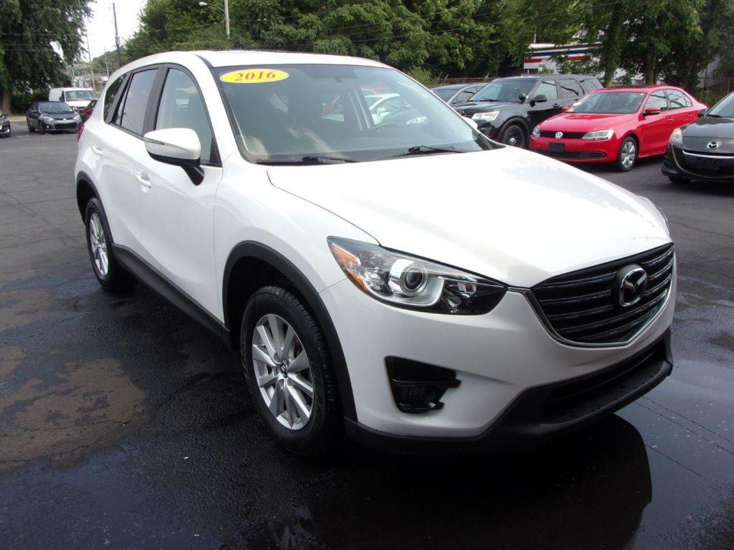 2016 WHITE MAZDA CX-5 TOURING (JM3KE4CY5G0) with an 2.5L engine, Automatic transmission, located at 501 E. Columbia St., Springfield, OH, 45503, (800) 262-7122, 39.925262, -83.801796 - Photo#2