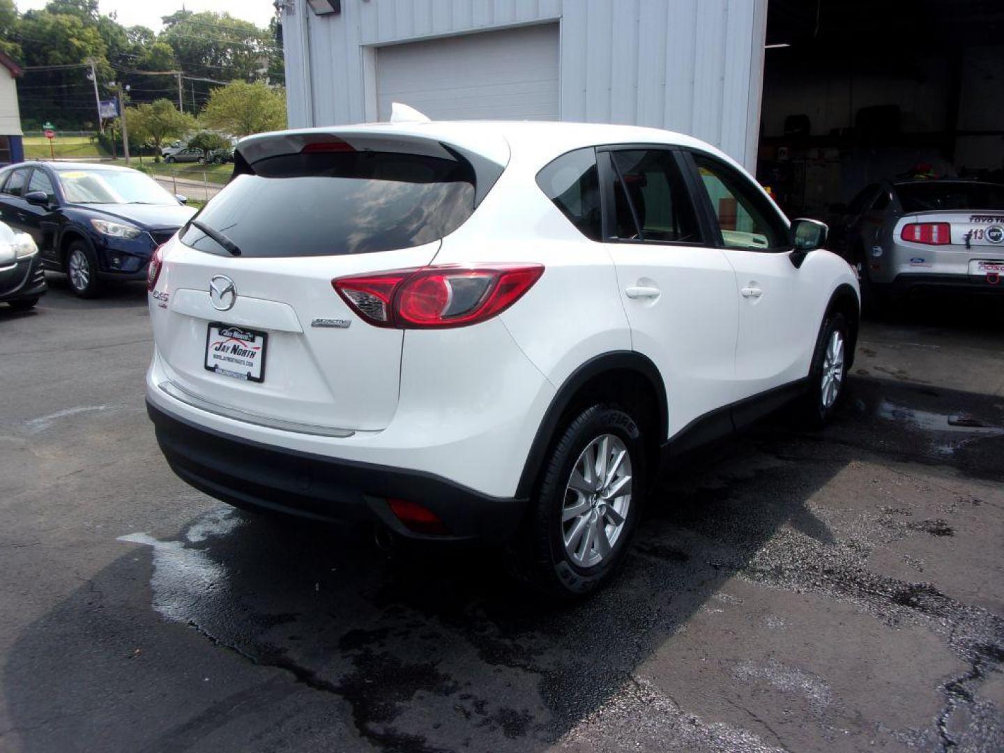 2016 WHITE MAZDA CX-5 TOURING (JM3KE4CY5G0) with an 2.5L engine, Automatic transmission, located at 501 E. Columbia St., Springfield, OH, 45503, (800) 262-7122, 39.925262, -83.801796 - Photo#3