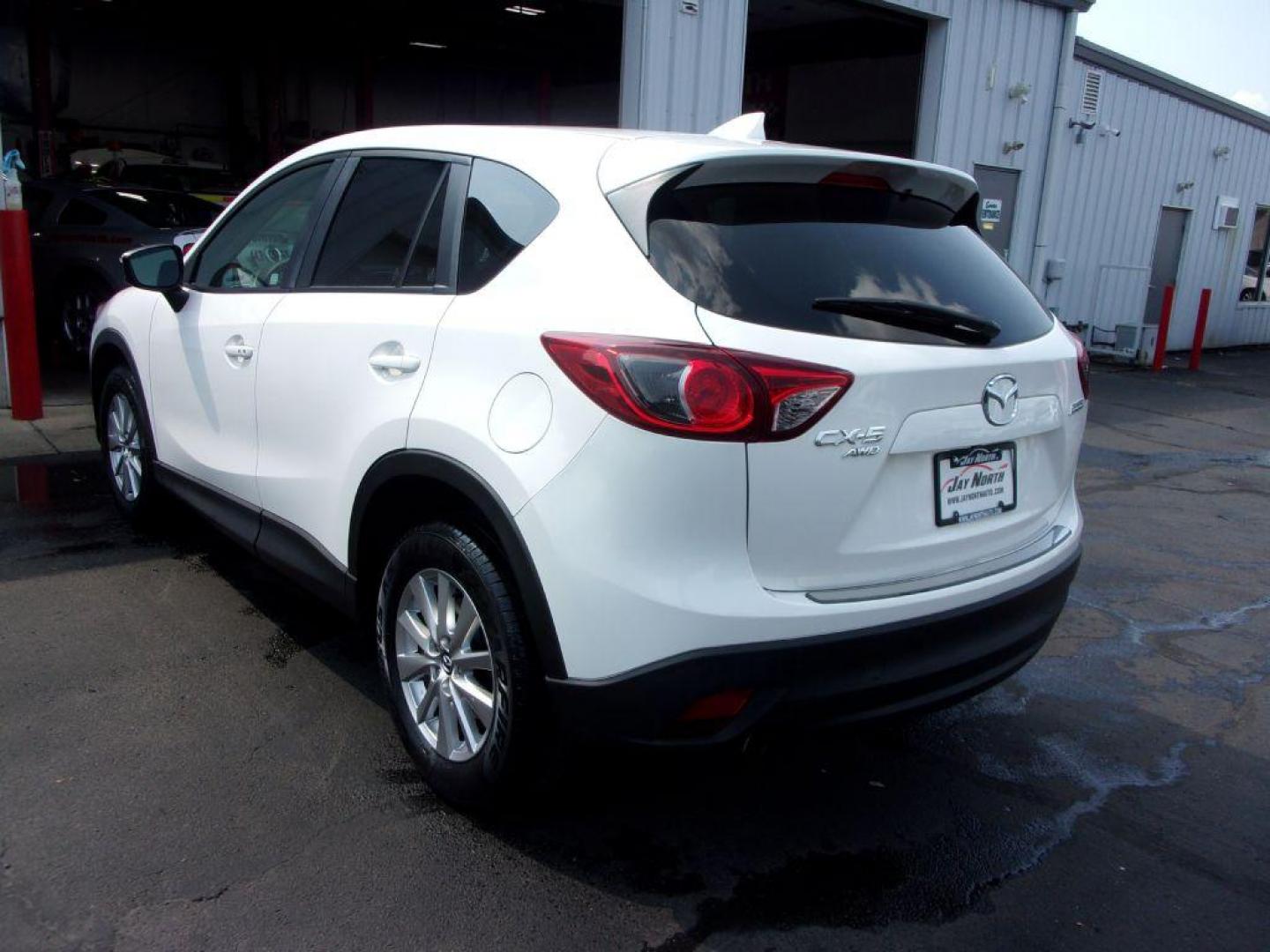 2016 WHITE MAZDA CX-5 TOURING (JM3KE4CY5G0) with an 2.5L engine, Automatic transmission, located at 501 E. Columbia St., Springfield, OH, 45503, (800) 262-7122, 39.925262, -83.801796 - Photo#5