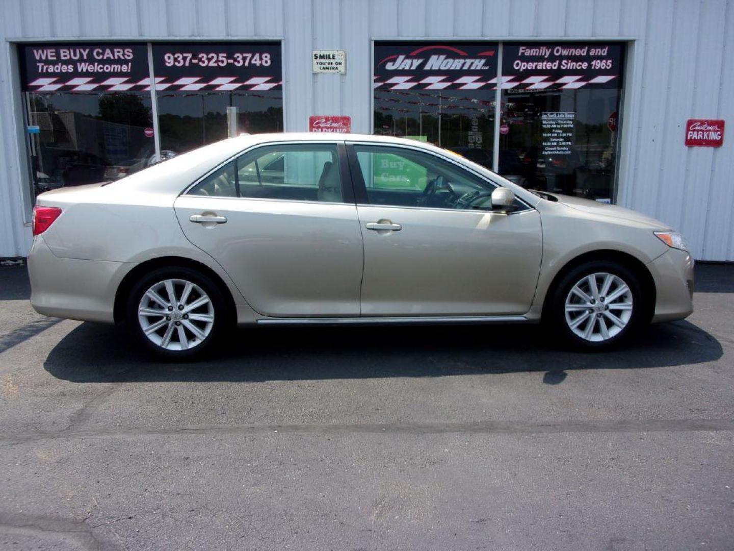 2013 GOLD TOYOTA CAMRY XLE (4T1BK1FK0DU) with an 3.5L engine, Automatic transmission, located at 501 E. Columbia St., Springfield, OH, 45503, (800) 262-7122, 39.925262, -83.801796 - ***XLE***54 Records on Carfax***New Front Pads and Rotors***Heated Leather Seats***Moonroof***Serviced and Detailed*** Jay North Auto has offered hand picked vehicles since 1965! Our customer's enjoy a NO pressure buying experience with a small town feel. All of our vehicles get fully inspected - Photo#0