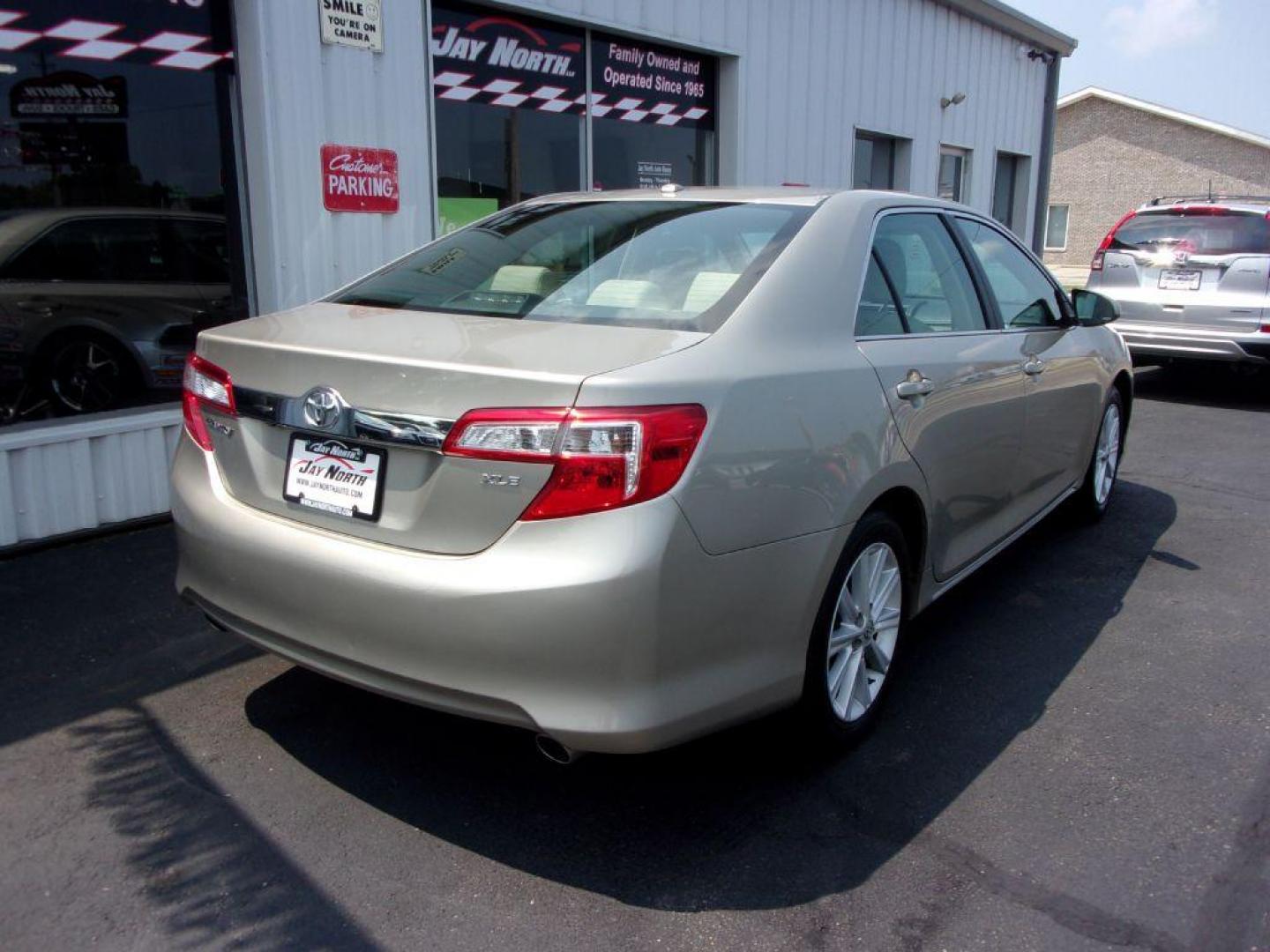 2013 GOLD TOYOTA CAMRY XLE (4T1BK1FK0DU) with an 3.5L engine, Automatic transmission, located at 501 E. Columbia St., Springfield, OH, 45503, (800) 262-7122, 39.925262, -83.801796 - Photo#3