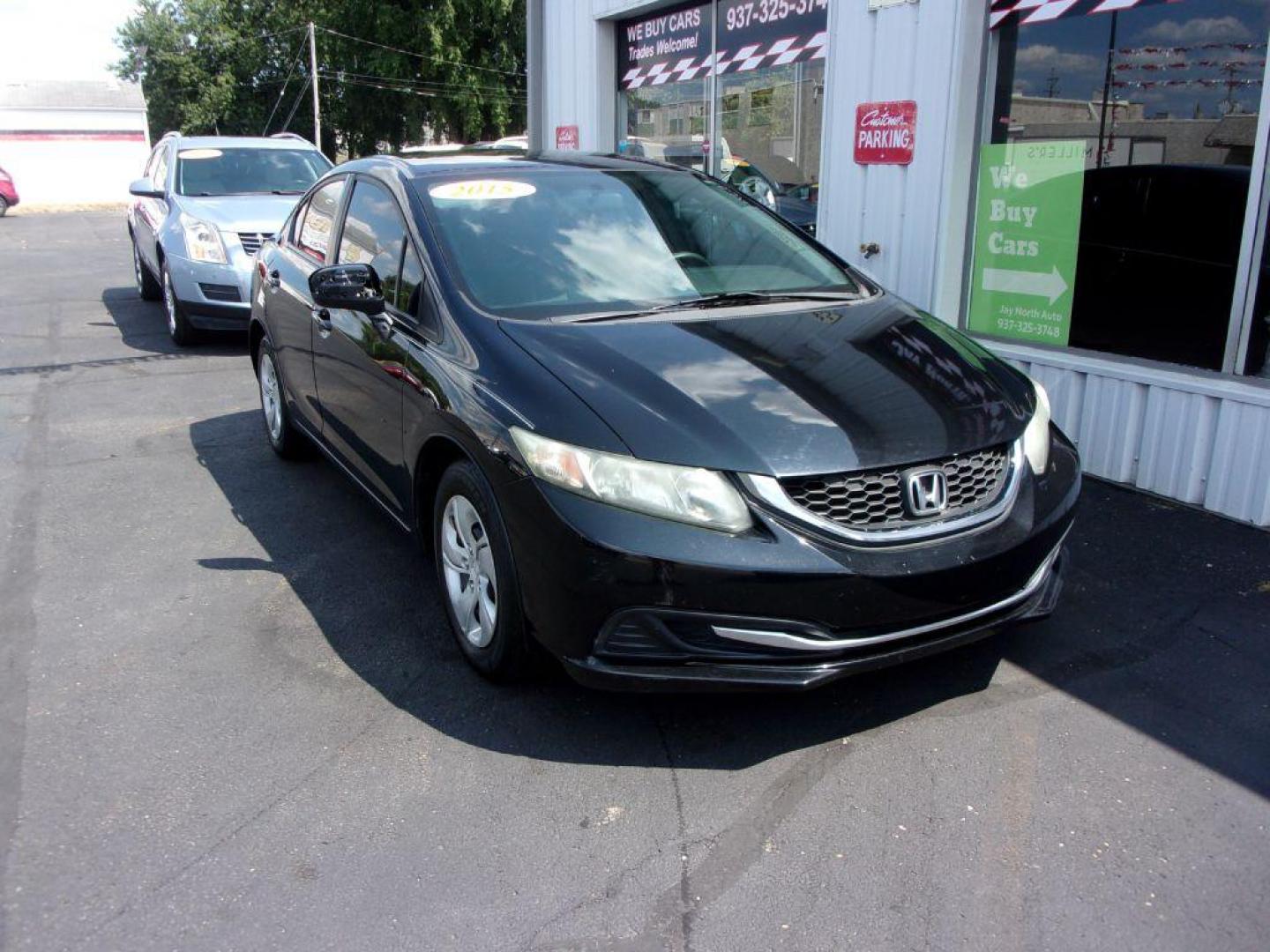 2015 BLACK HONDA CIVIC LX (19XFB2E55FE) with an 1.8L engine, 5-Speed Manual transmission, located at 501 E. Columbia St., Springfield, OH, 45503, (800) 262-7122, 39.925262, -83.801796 - *** LX *** 5 Speed Manual *** Serviced and Detailed *** Jay North Auto has offered hand picked vehicles since 1965! Our customer's enjoy a NO pressure buying experience with a small town feel. All of our vehicles get fully inspected and detailed. We are a preferred dealer for many local credit - Photo#2