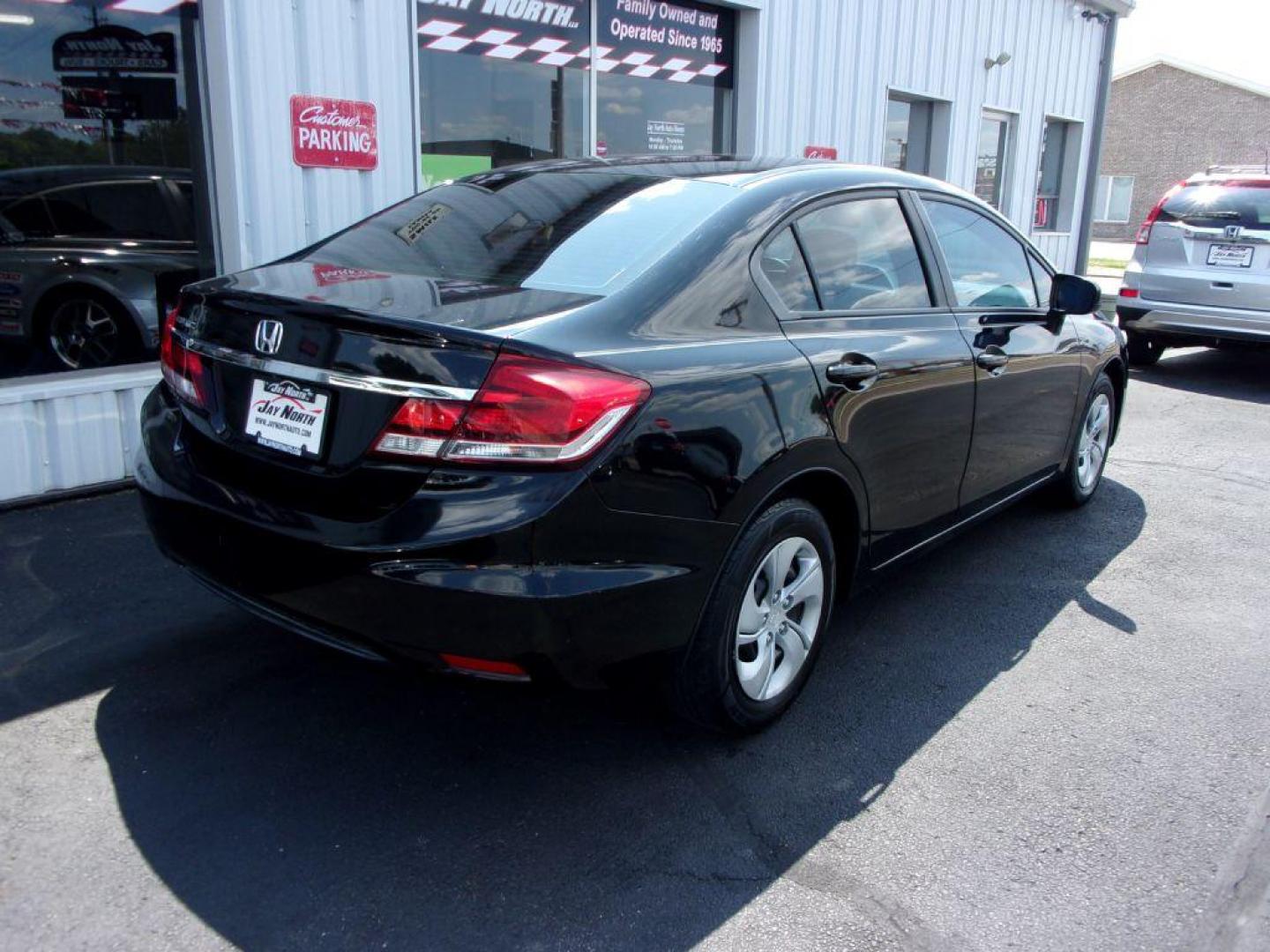 2015 BLACK HONDA CIVIC LX (19XFB2E55FE) with an 1.8L engine, 5-Speed Manual transmission, located at 501 E. Columbia St., Springfield, OH, 45503, (800) 262-7122, 39.925262, -83.801796 - *** LX *** 5 Speed Manual *** Serviced and Detailed *** Jay North Auto has offered hand picked vehicles since 1965! Our customer's enjoy a NO pressure buying experience with a small town feel. All of our vehicles get fully inspected and detailed. We are a preferred dealer for many local credit - Photo#3