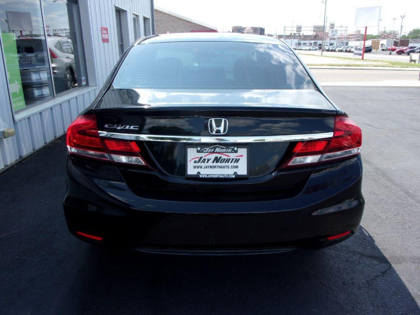 2015 BLACK HONDA CIVIC LX (19XFB2E55FE) with an 1.8L engine, 5-Speed Manual transmission, located at 501 E. Columbia St., Springfield, OH, 45503, (800) 262-7122, 39.925262, -83.801796 - *** LX *** 5 Speed Manual *** Serviced and Detailed *** Jay North Auto has offered hand picked vehicles since 1965! Our customer's enjoy a NO pressure buying experience with a small town feel. All of our vehicles get fully inspected and detailed. We are a preferred dealer for many local credit - Photo#4