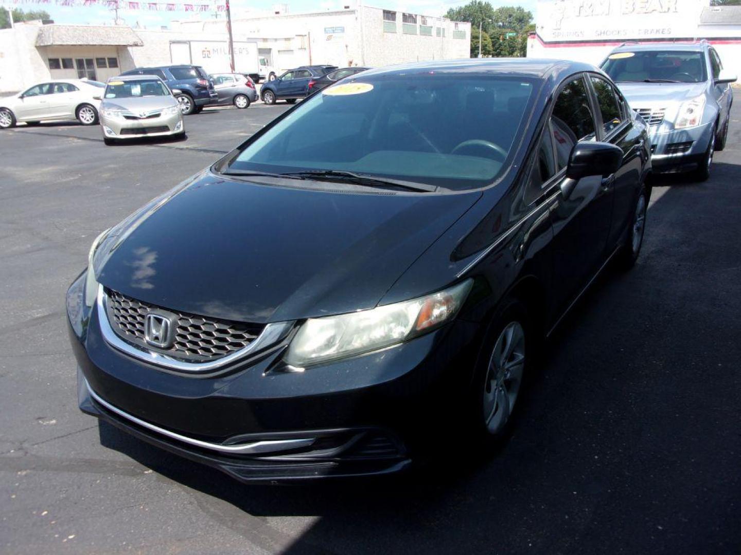 2015 BLACK HONDA CIVIC LX (19XFB2E55FE) with an 1.8L engine, 5-Speed Manual transmission, located at 501 E. Columbia St., Springfield, OH, 45503, (800) 262-7122, 39.925262, -83.801796 - *** LX *** 5 Speed Manual *** Serviced and Detailed *** Jay North Auto has offered hand picked vehicles since 1965! Our customer's enjoy a NO pressure buying experience with a small town feel. All of our vehicles get fully inspected and detailed. We are a preferred dealer for many local credit - Photo#6