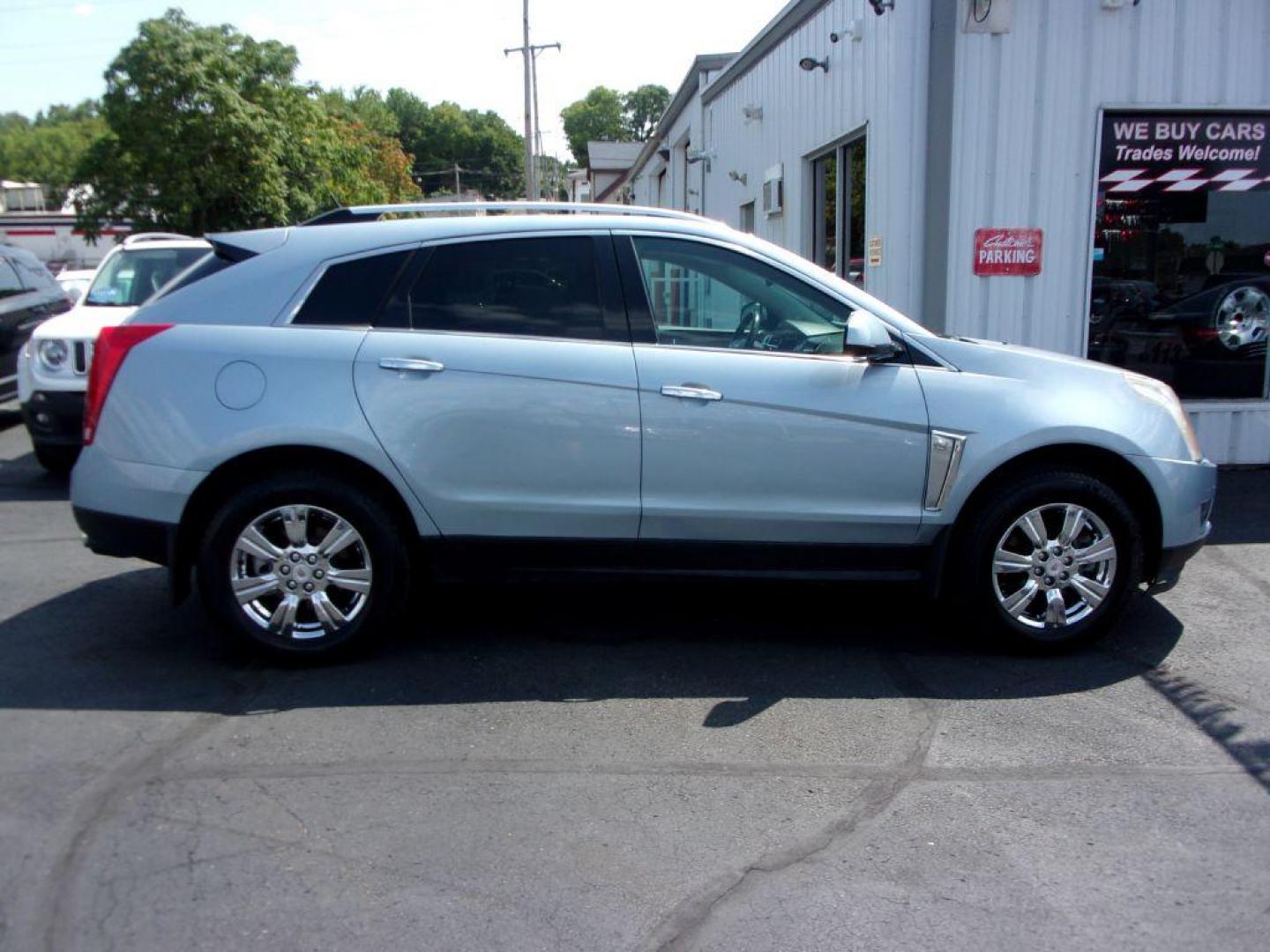 2014 BLUE CADILLAC SRX LUXURY COLLECTION (3GYFNBE36ES) with an 3.6L engine, Automatic transmission, located at 501 E. Columbia St., Springfield, OH, 45503, (800) 262-7122, 39.925262, -83.801796 - *** Low Miles *** Luxury Collection *** Moonroof *** Bose Audio *** Remote Start *** Heated and Cooled Seating *** FWD V6 *** Jay North Auto has offered hand picked vehicles since 1965! Our customer's enjoy a NO pressure buying experience with a small town feel. All of our vehicles get fully ins - Photo#0