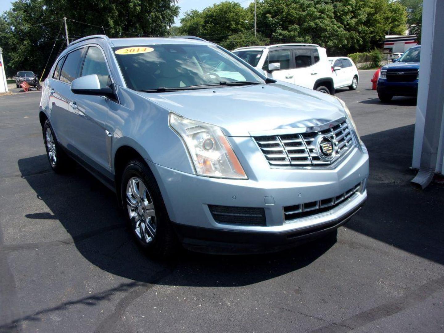 2014 BLUE CADILLAC SRX LUXURY COLLECTION (3GYFNBE36ES) with an 3.6L engine, Automatic transmission, located at 501 E. Columbia St., Springfield, OH, 45503, (800) 262-7122, 39.925262, -83.801796 - *** Low Miles *** Luxury Collection *** Moonroof *** Bose Audio *** Remote Start *** Heated and Cooled Seating *** FWD V6 *** Jay North Auto has offered hand picked vehicles since 1965! Our customer's enjoy a NO pressure buying experience with a small town feel. All of our vehicles get fully ins - Photo#2