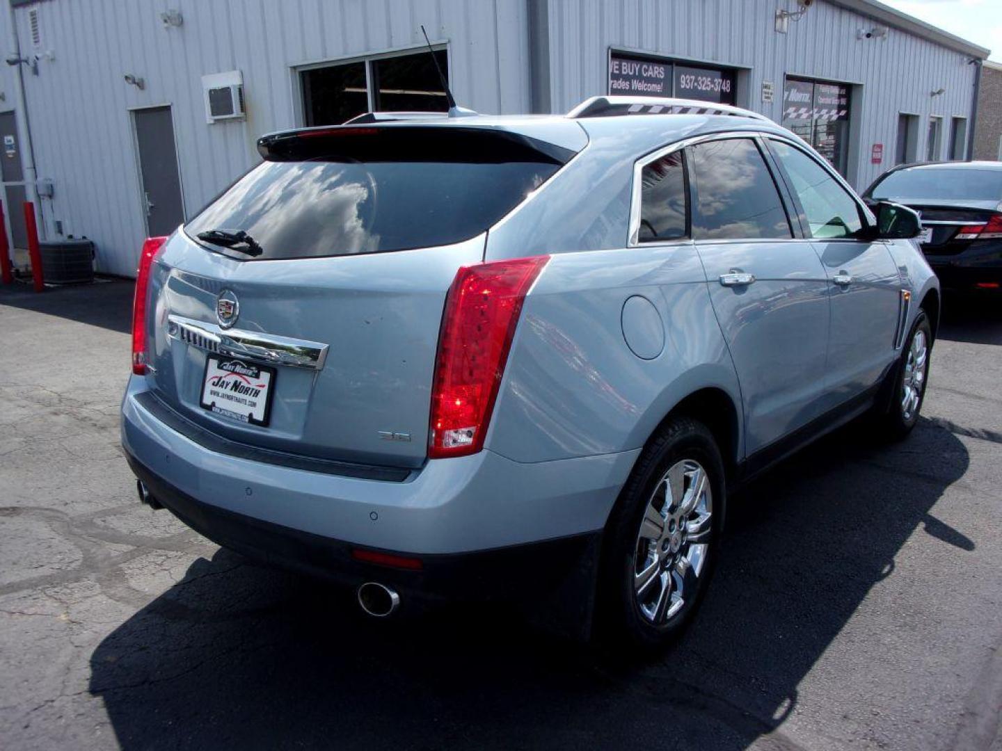 2014 BLUE CADILLAC SRX LUXURY COLLECTION (3GYFNBE36ES) with an 3.6L engine, Automatic transmission, located at 501 E. Columbia St., Springfield, OH, 45503, (800) 262-7122, 39.925262, -83.801796 - Photo#3