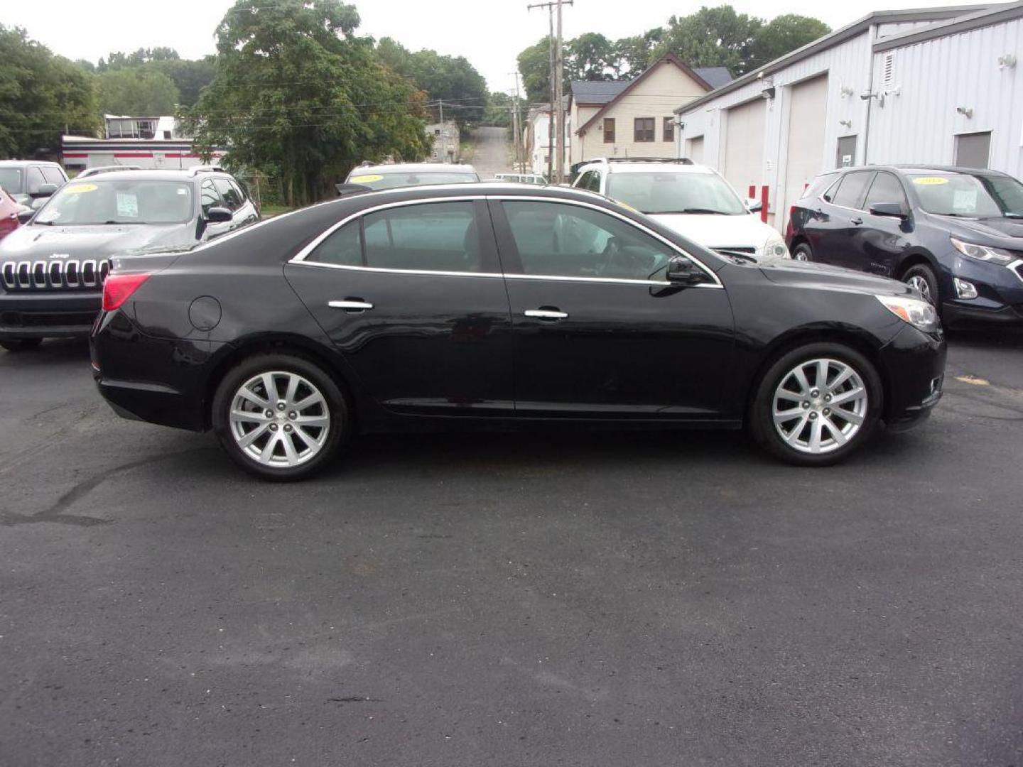 2016 BLACK CHEVROLET MALIBU LIMITED LTZ (1G11E5SA2GU) with an 2.5L engine, Automatic transmission, located at 501 E. Columbia St., Springfield, OH, 45503, (800) 262-7122, 39.925262, -83.801796 - Photo#0