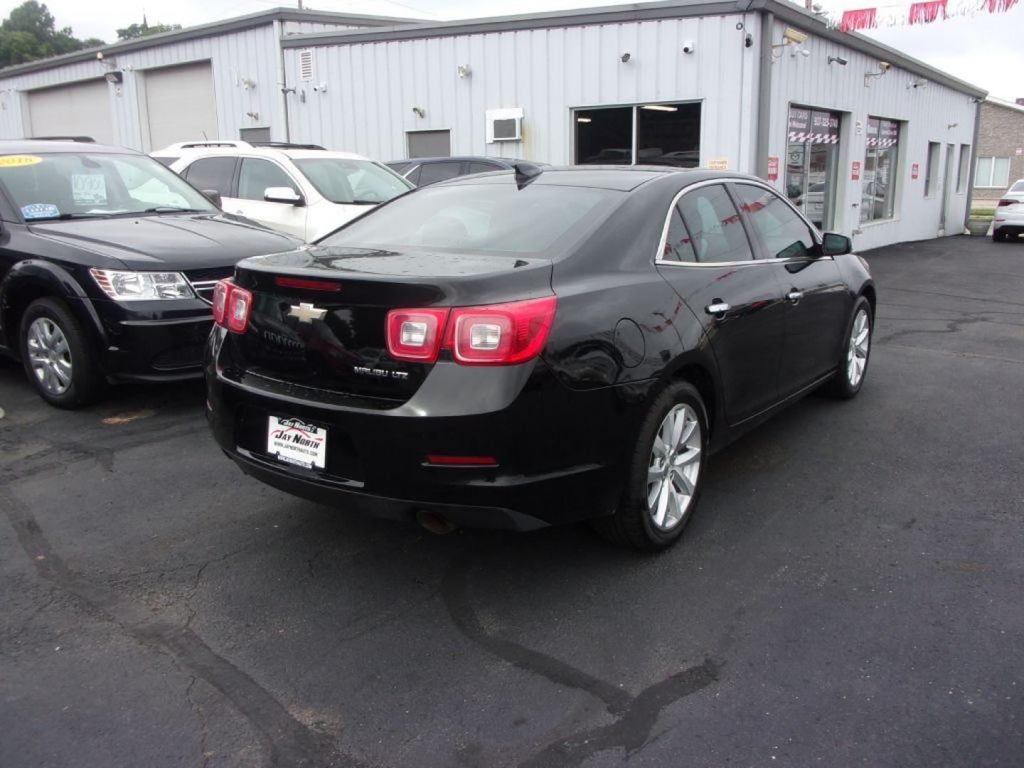 2016 BLACK CHEVROLET MALIBU LIMITED LTZ (1G11E5SA2GU) with an 2.5L engine, Automatic transmission, located at 501 E. Columbia St., Springfield, OH, 45503, (800) 262-7122, 39.925262, -83.801796 - Photo#3