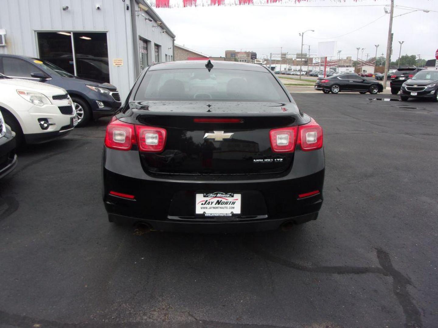 2016 BLACK CHEVROLET MALIBU LIMITED LTZ (1G11E5SA2GU) with an 2.5L engine, Automatic transmission, located at 501 E. Columbia St., Springfield, OH, 45503, (800) 262-7122, 39.925262, -83.801796 - Photo#4