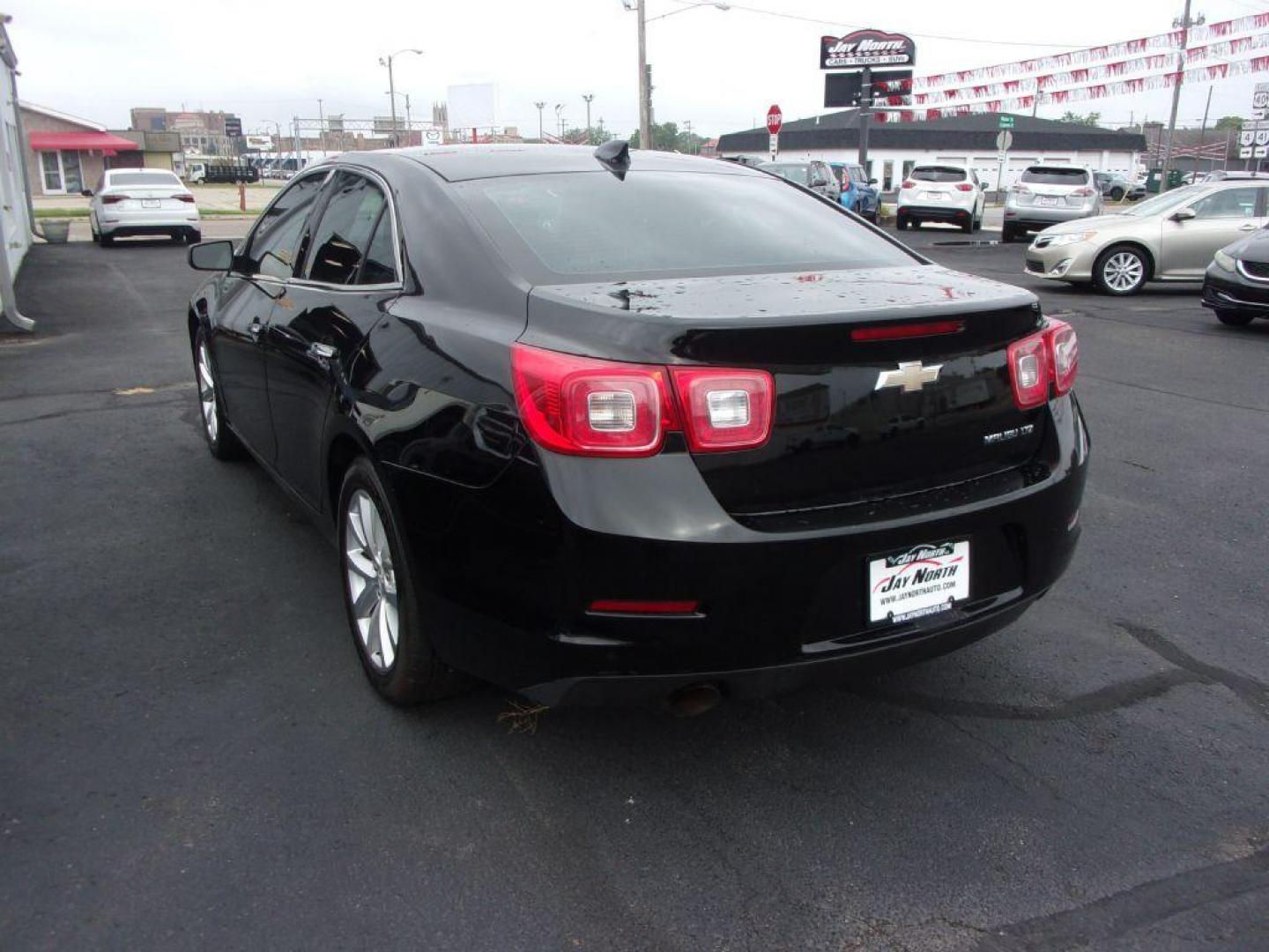 2016 BLACK CHEVROLET MALIBU LIMITED LTZ (1G11E5SA2GU) with an 2.5L engine, Automatic transmission, located at 501 E. Columbia St., Springfield, OH, 45503, (800) 262-7122, 39.925262, -83.801796 - Photo#5