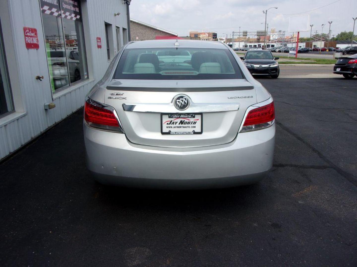 2011 SILVER BUICK LACROSSE CX (1G4GA5EC3BF) with an 2.4L engine, Automatic transmission, located at 501 E. Columbia St., Springfield, OH, 45503, (800) 262-7122, 39.925262, -83.801796 - *** Serviced and Detailed *** 34 Service Records on CarFax *** NICE! *** FWD 2.4L *** Jay North Auto has offered hand picked vehicles since 1965! Our customer's enjoy a NO pressure buying experience with a small town feel. All of our vehicles get fully inspected and detailed. We are a preferred - Photo#4